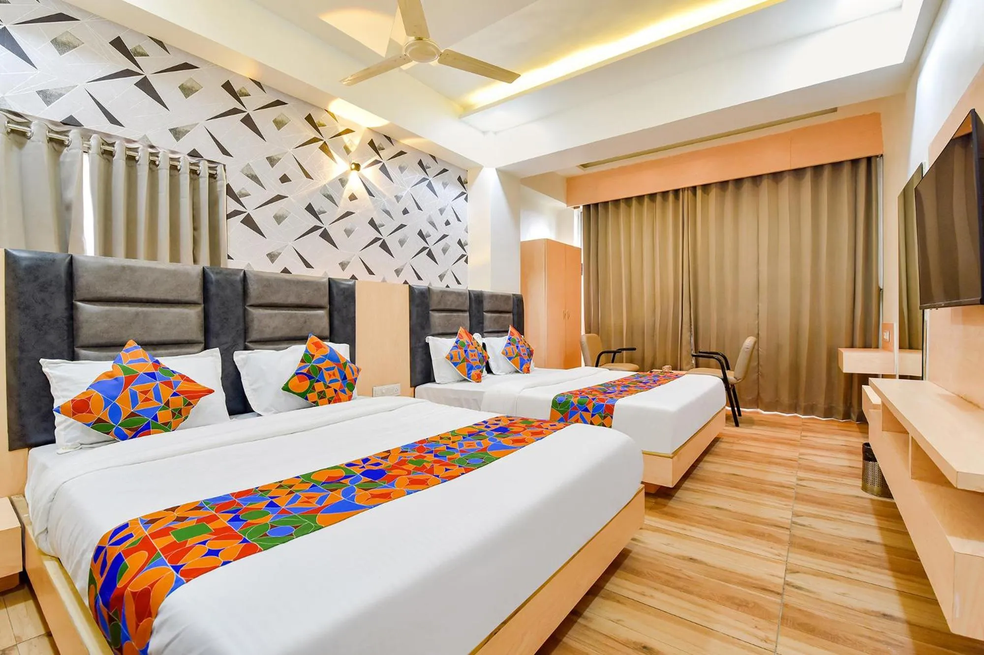 Bed in FabHotel Symphony Grand