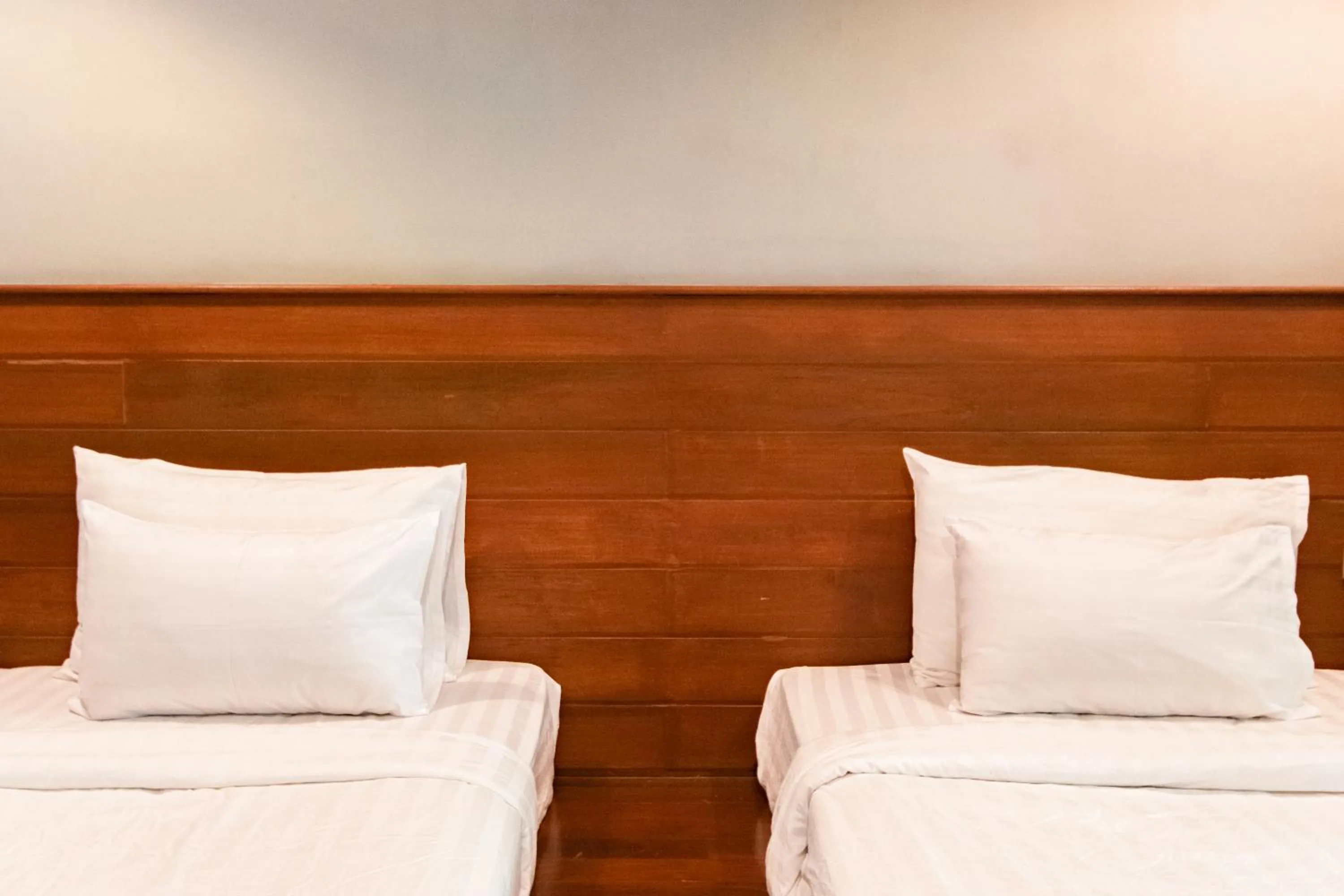 Bed in Namsai Resort Kanchanaburi