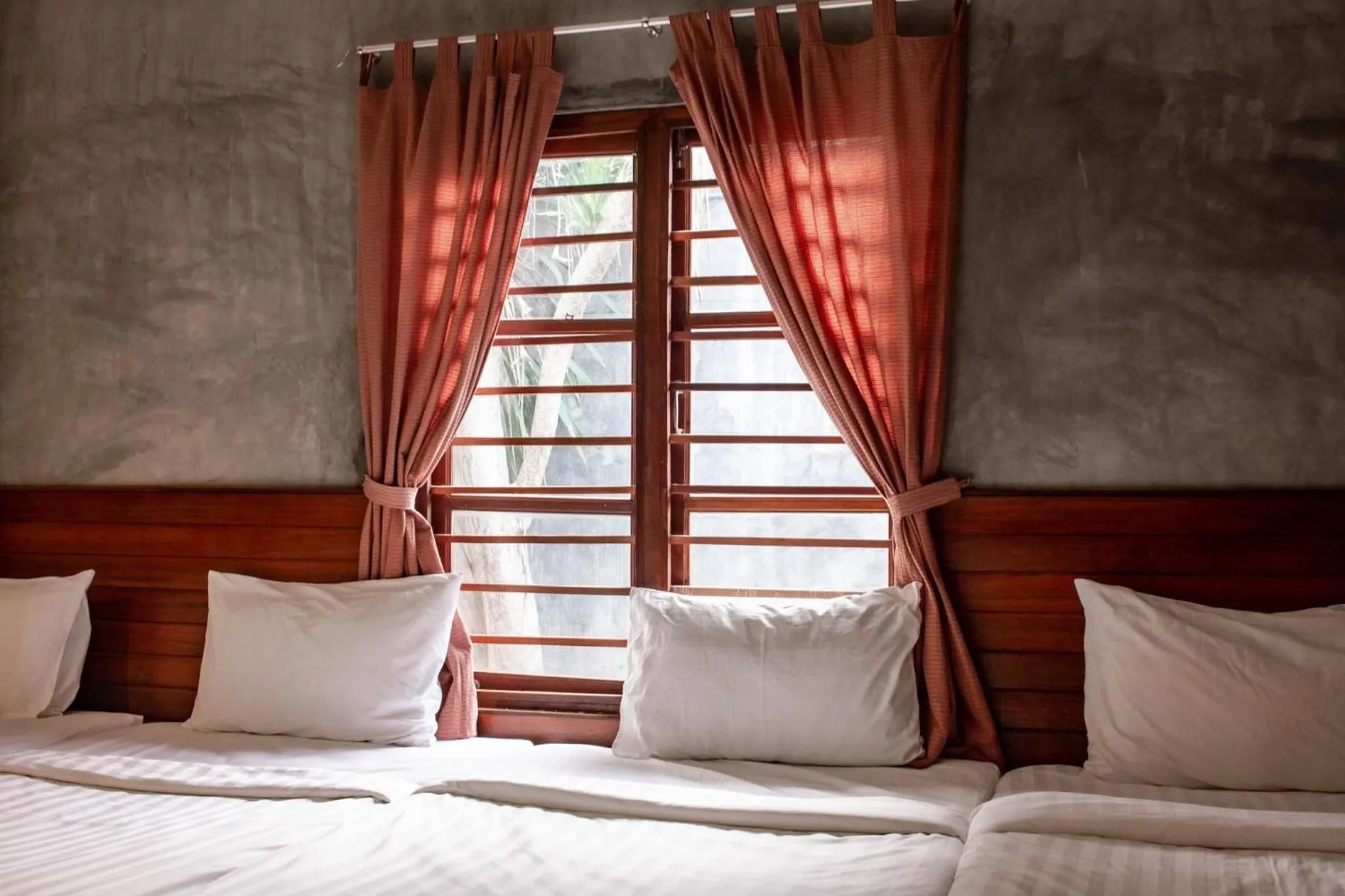 Bed in Namsai Resort Kanchanaburi