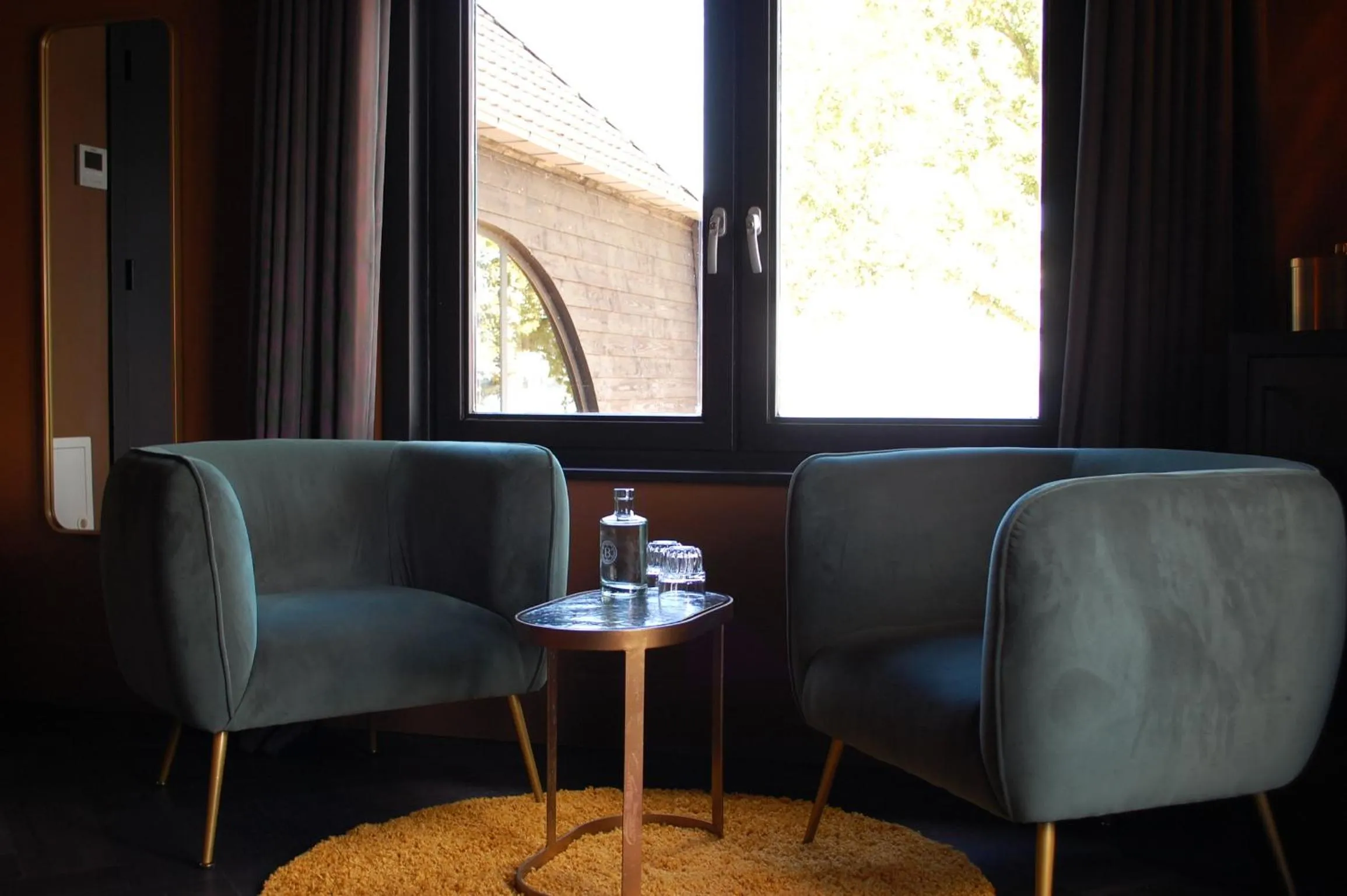Seating area in Boutique Hotel de Bungelaer