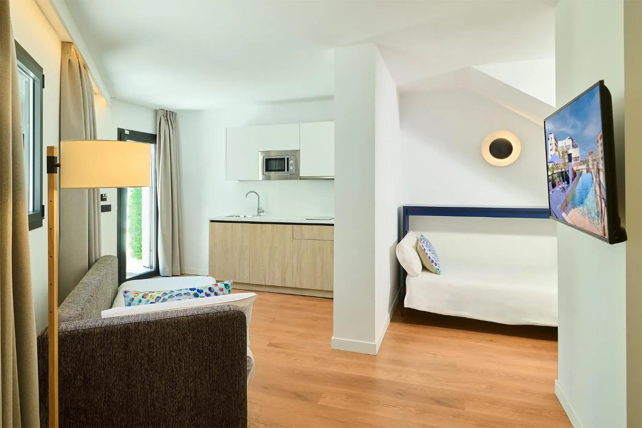 Photo of the whole room, Bed in Apartamentos Luna Suites Granada Photo of the whole room, Bed in Apartamentos Luna Suites Granada