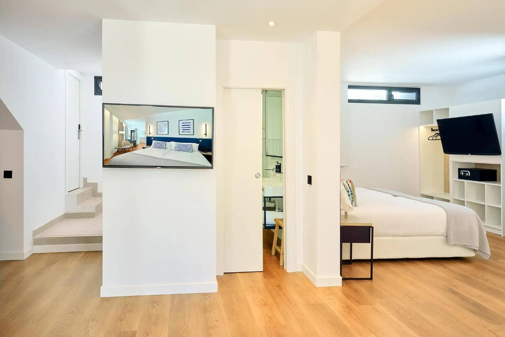 Photo of the whole room, Bed in Apartamentos Luna Suites Granada Photo of the whole room, Bed in Apartamentos Luna Suites Granada