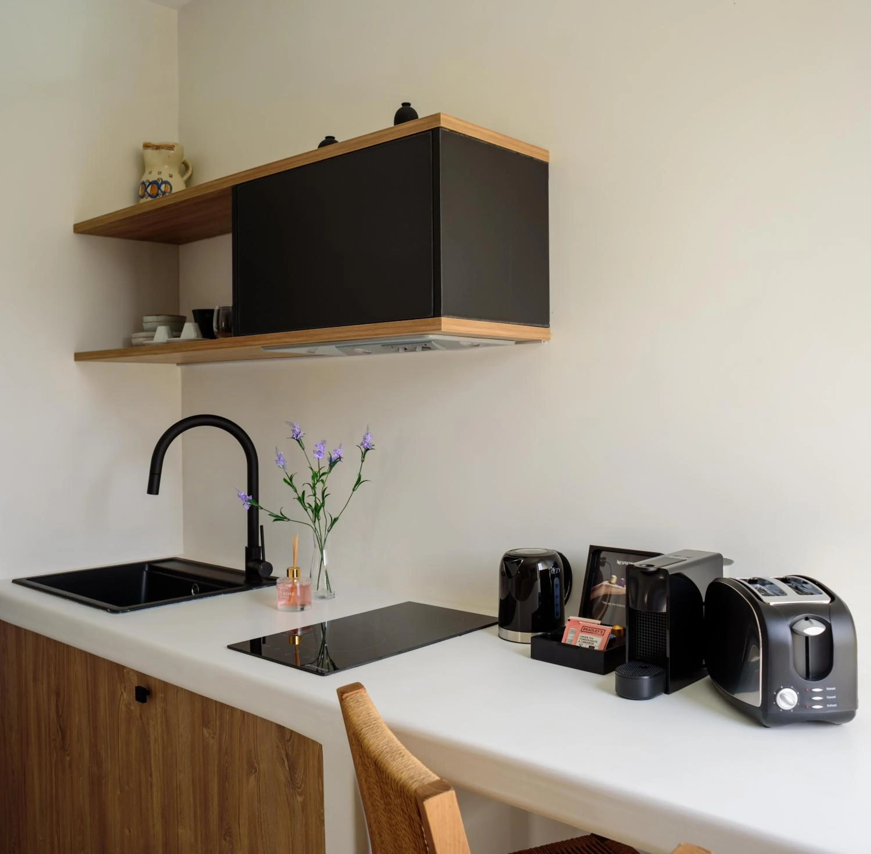 Kitchen or kitchenette in Ryolithos Suites