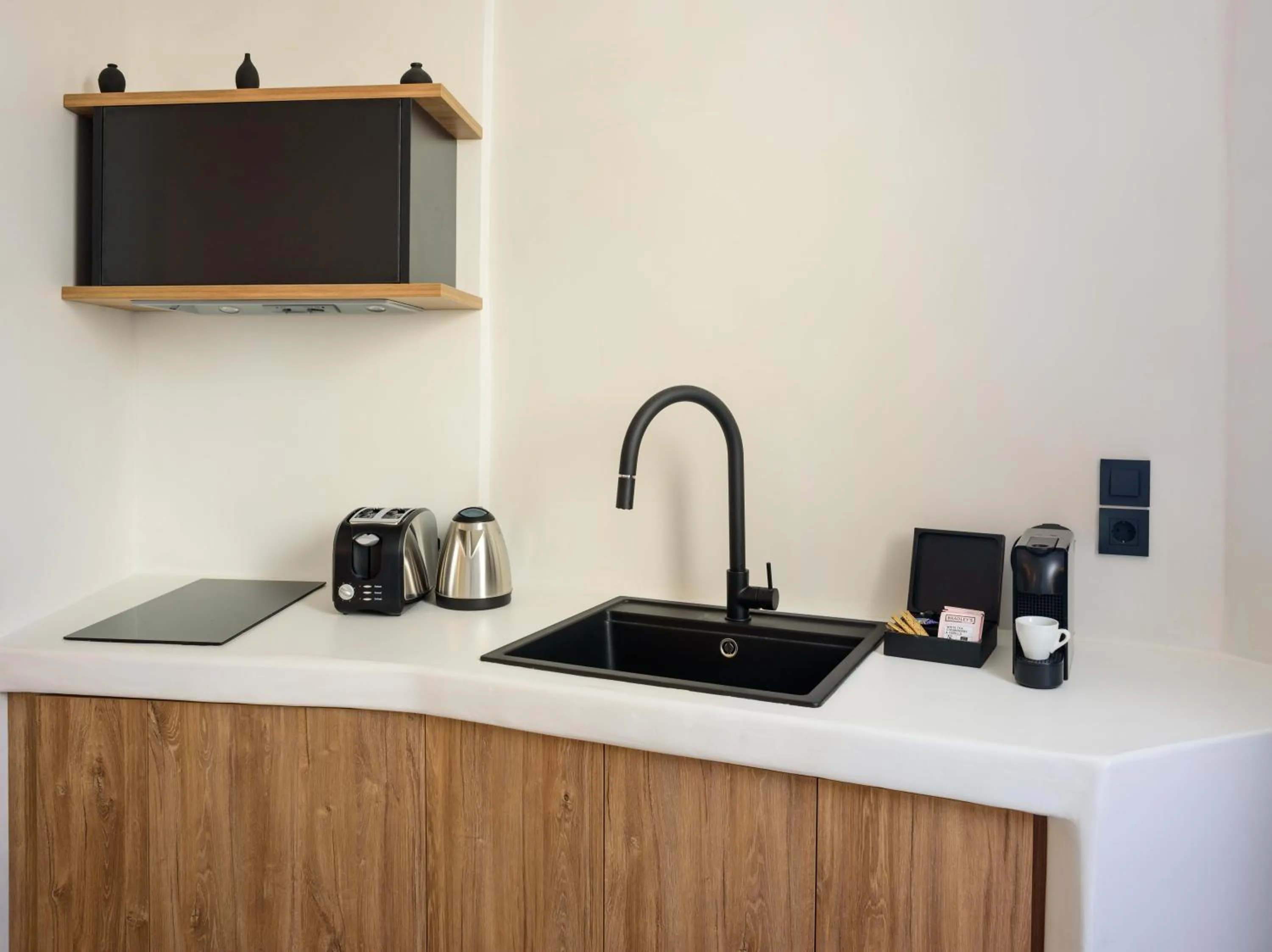 Kitchen or kitchenette in Ryolithos Suites