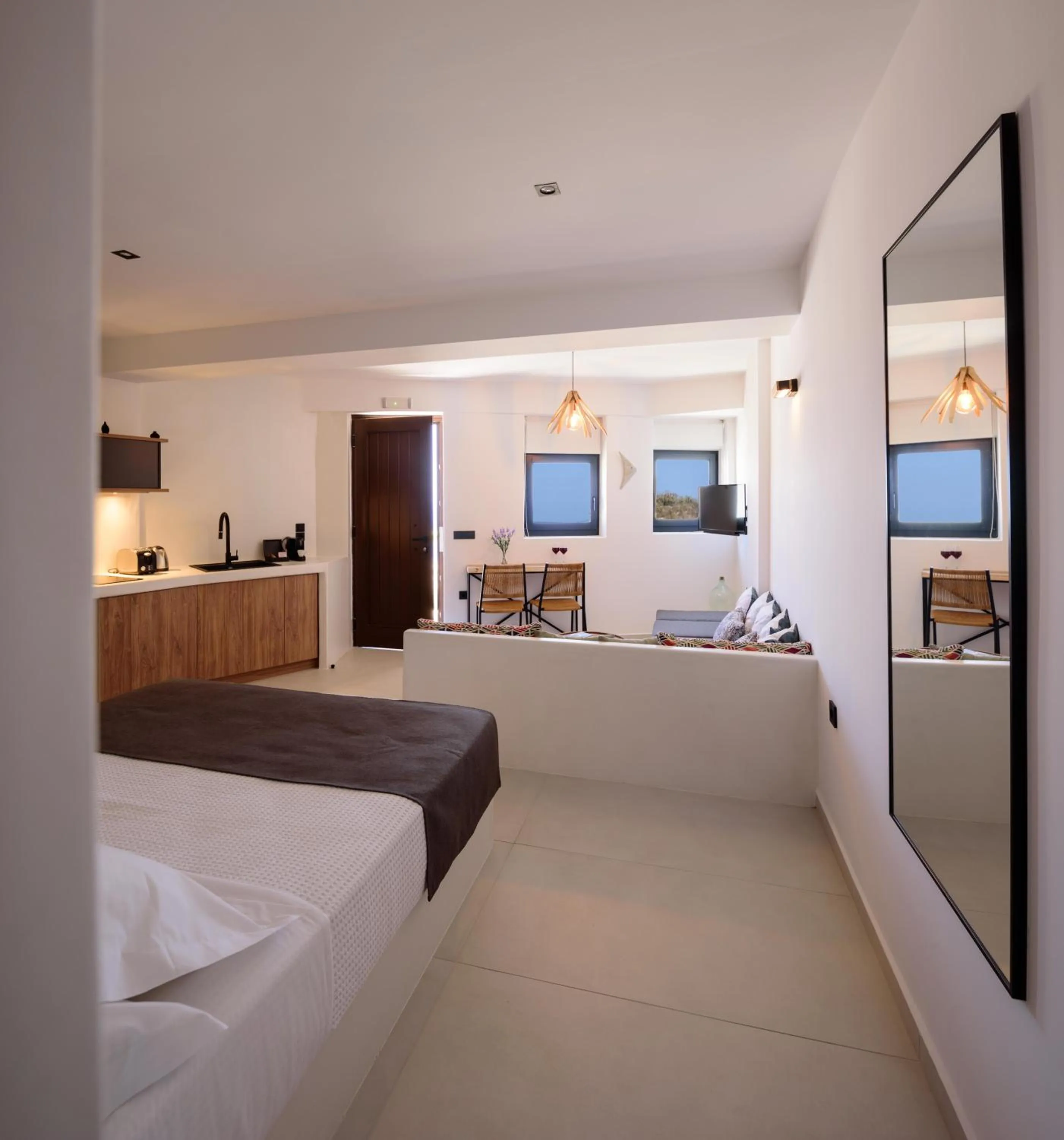 Photo of the whole room, Bed in Ryolithos Suites