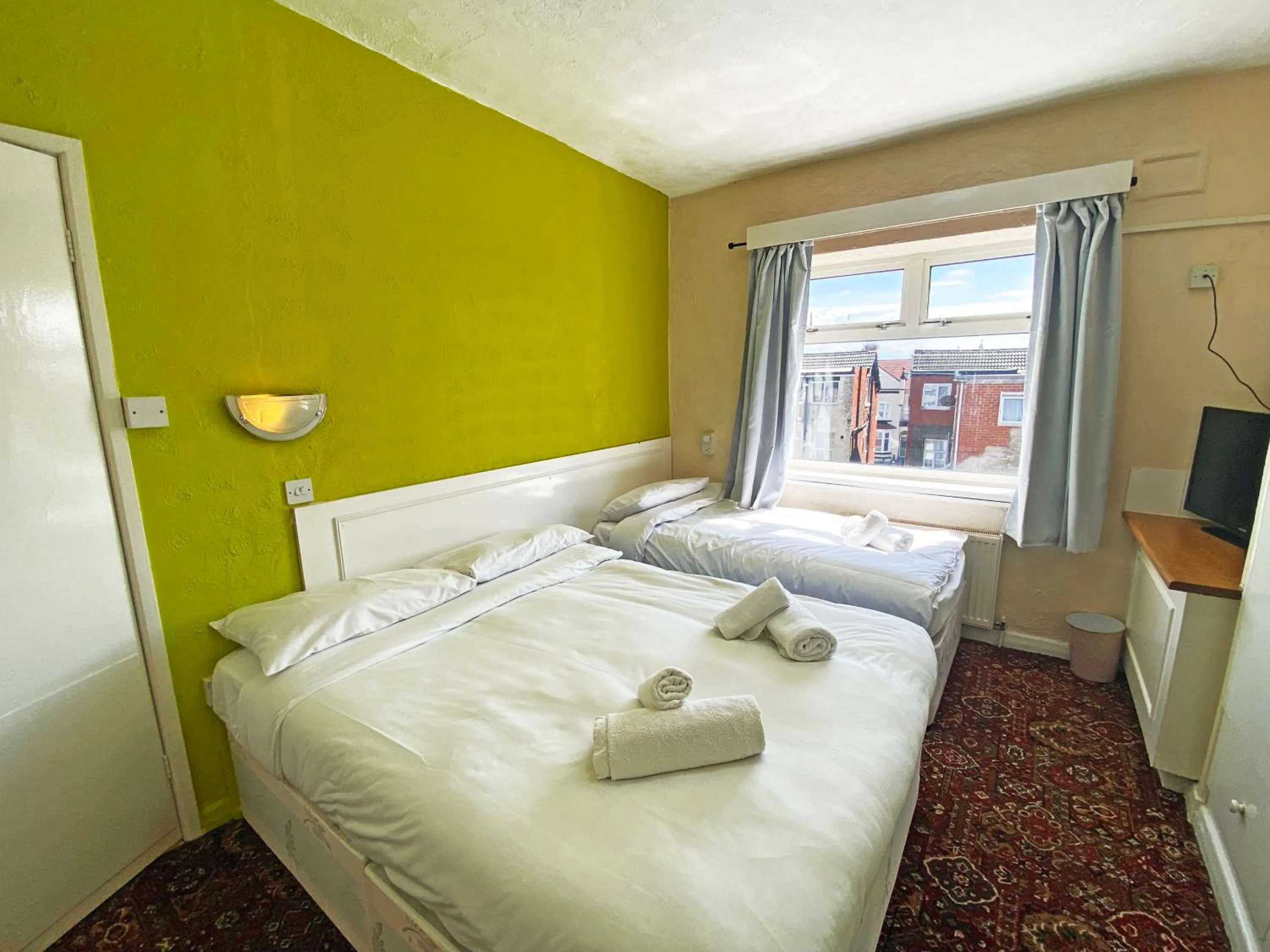 Bedroom in The J & S Hotel