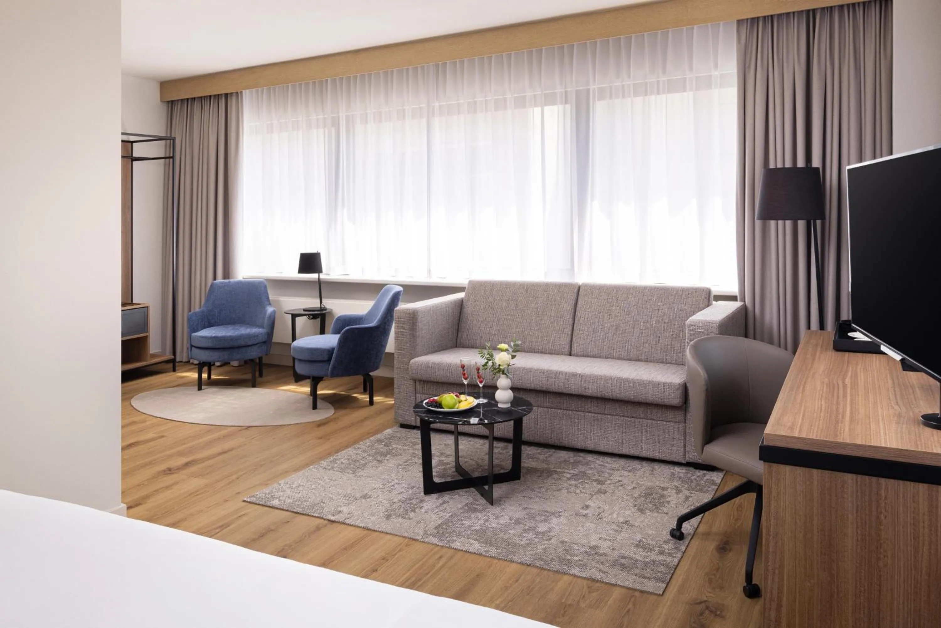 Bedroom in NH Atlanta Rotterdam Hotel