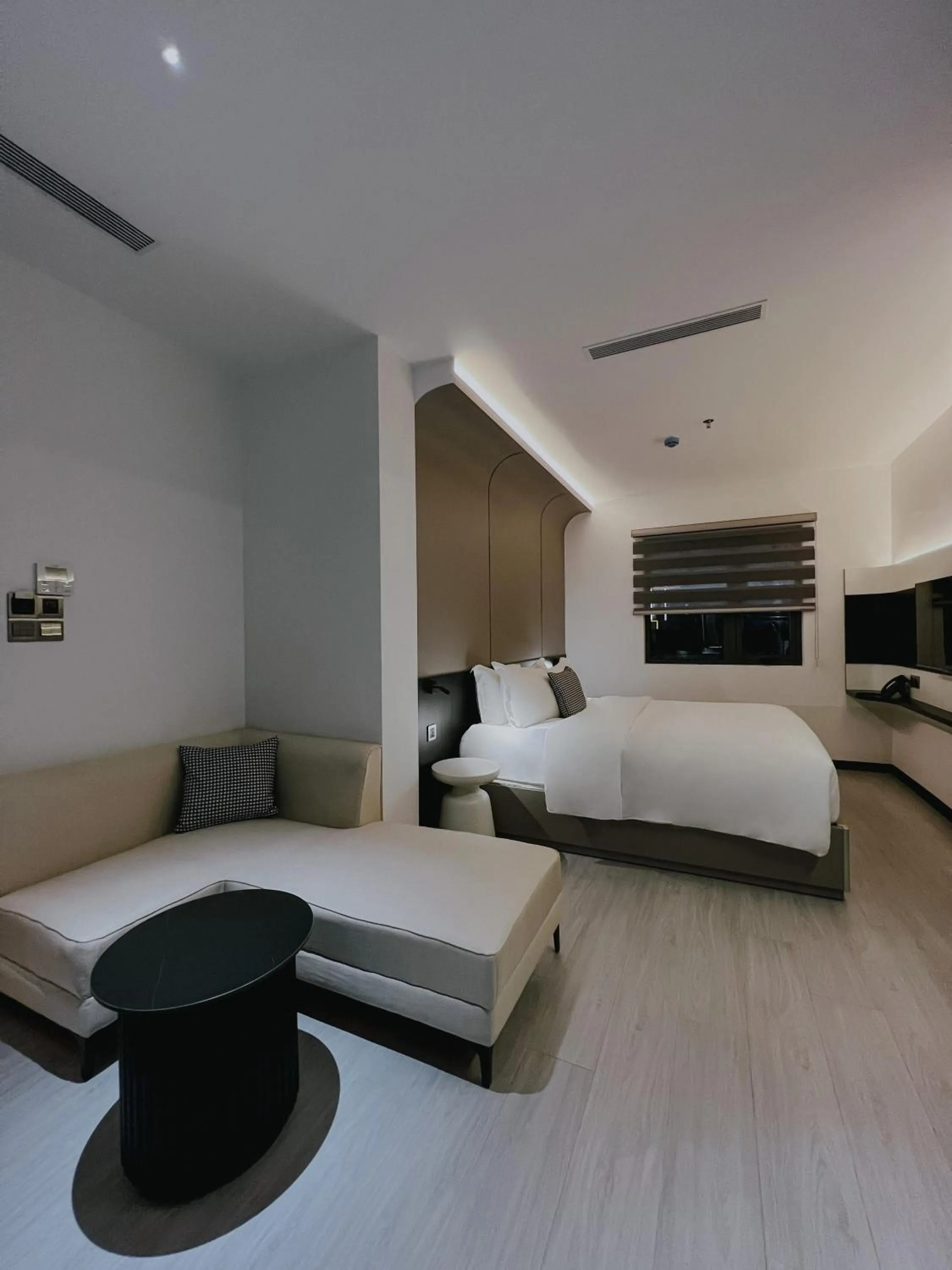 Living room, Bed in The Concept Hotel HCMC- District 1