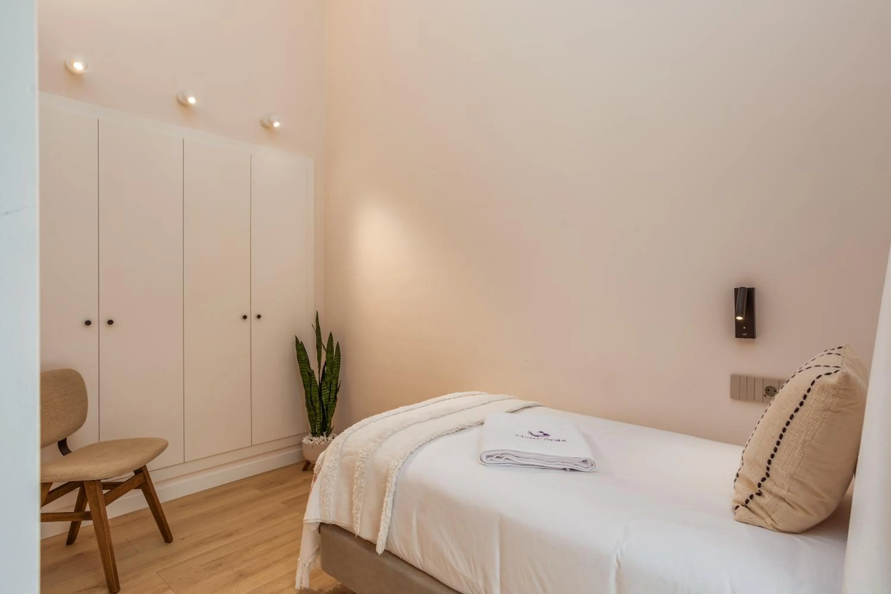 Bed in Marconia Boutique Residence