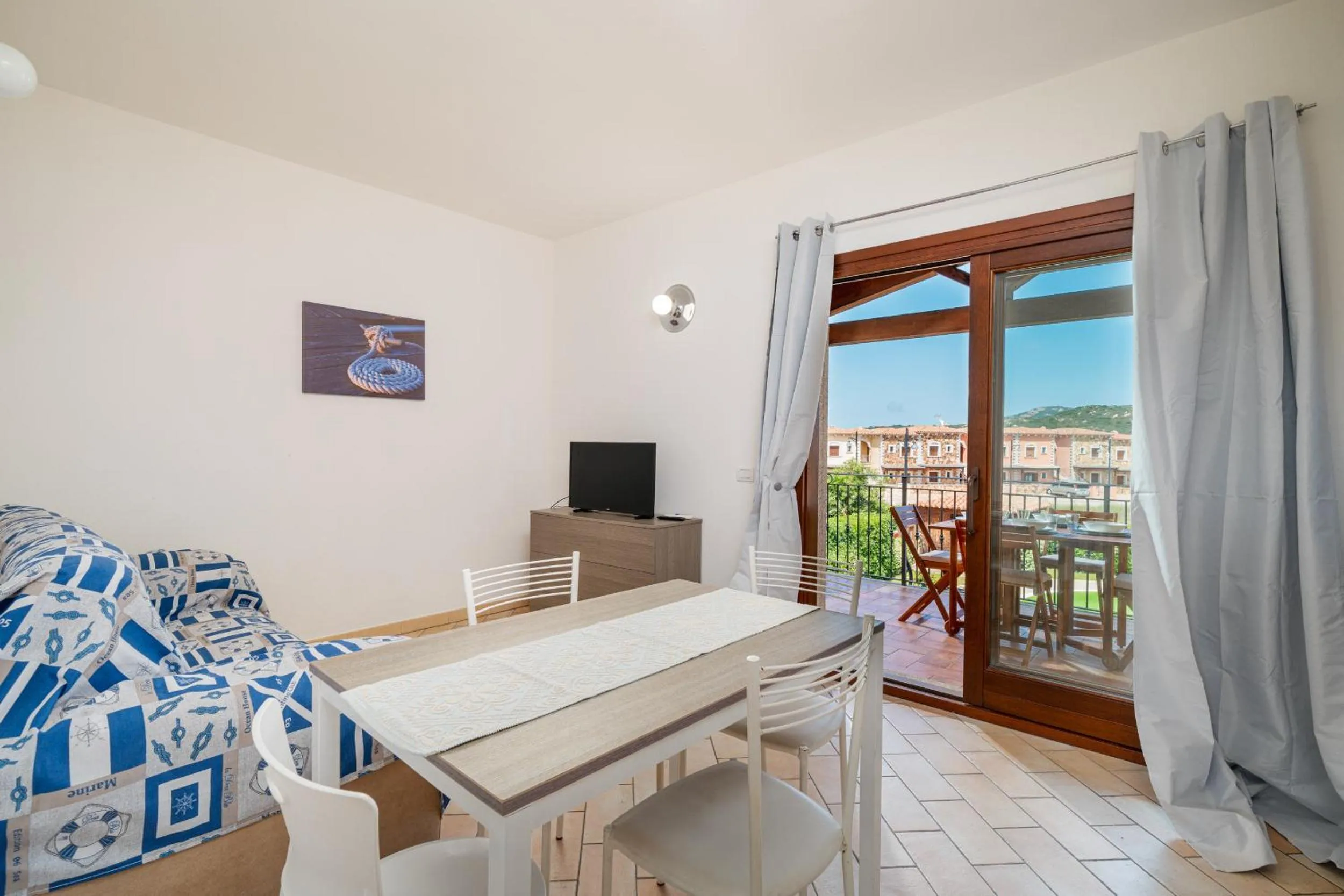 Communal lounge/ TV room in Myrsine 2 by Wonderful Italy