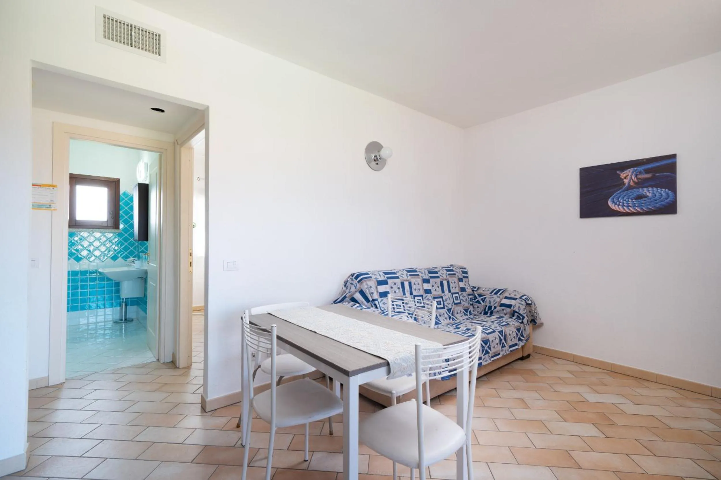 Communal lounge/ TV room in Myrsine 2 by Wonderful Italy