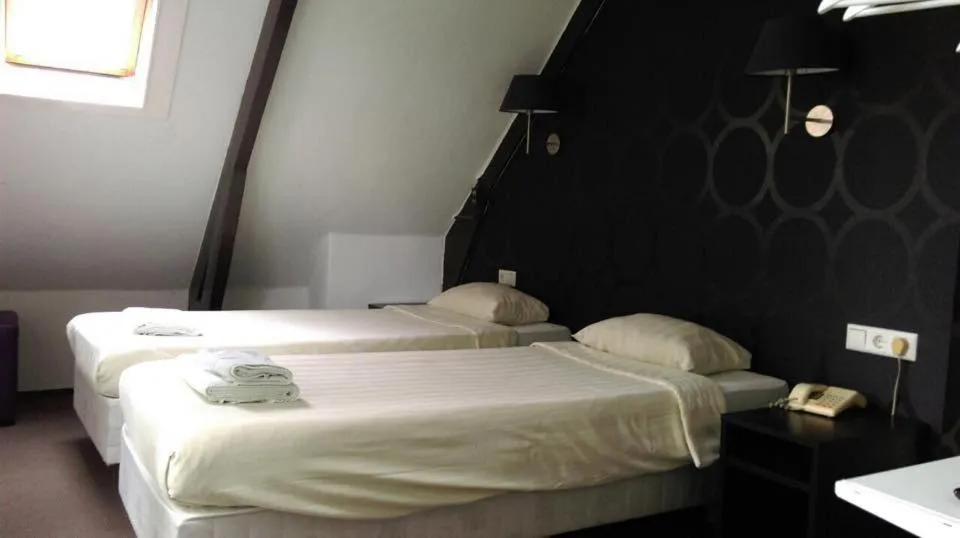 Bed in Hotel Bellington