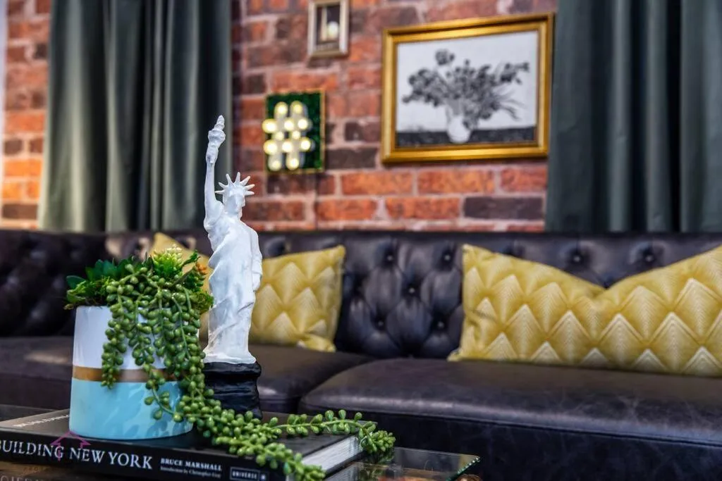 Living room in Luxe New York Style Bsmt Suite, Near DT & WEM, King Bed, WiFi