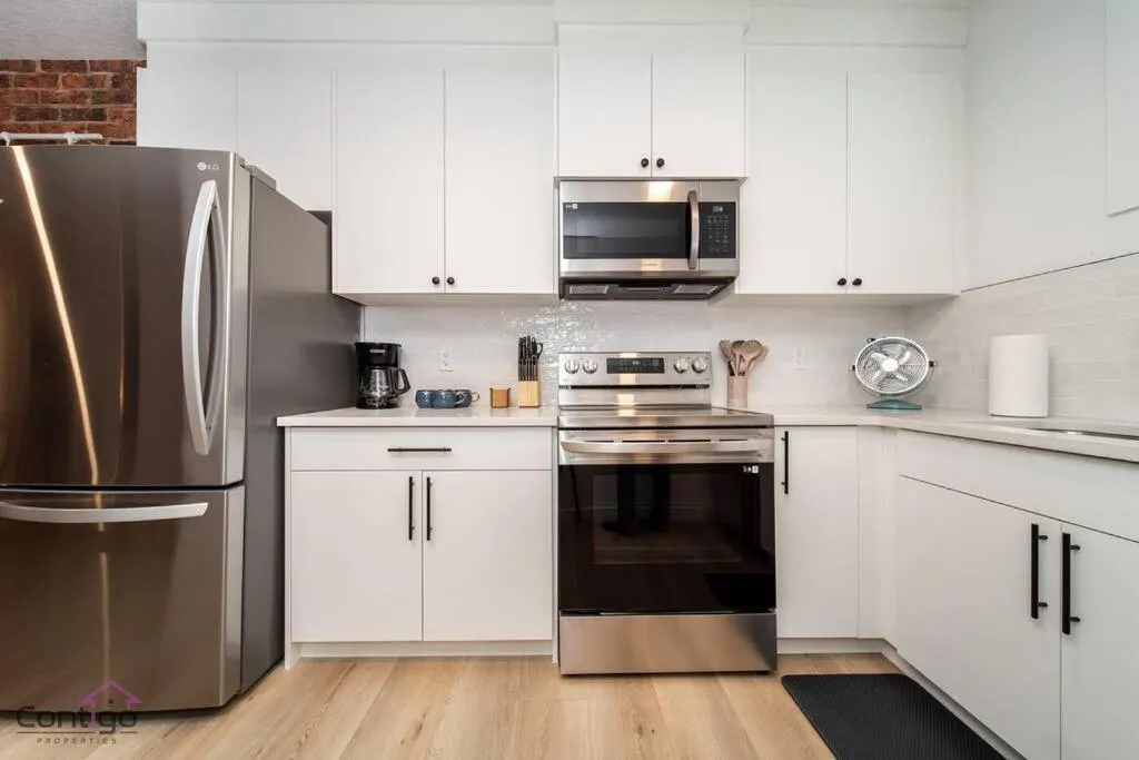 Coffee/tea facilities in Luxe New York Style Bsmt Suite, Near DT & WEM, King Bed, WiFi