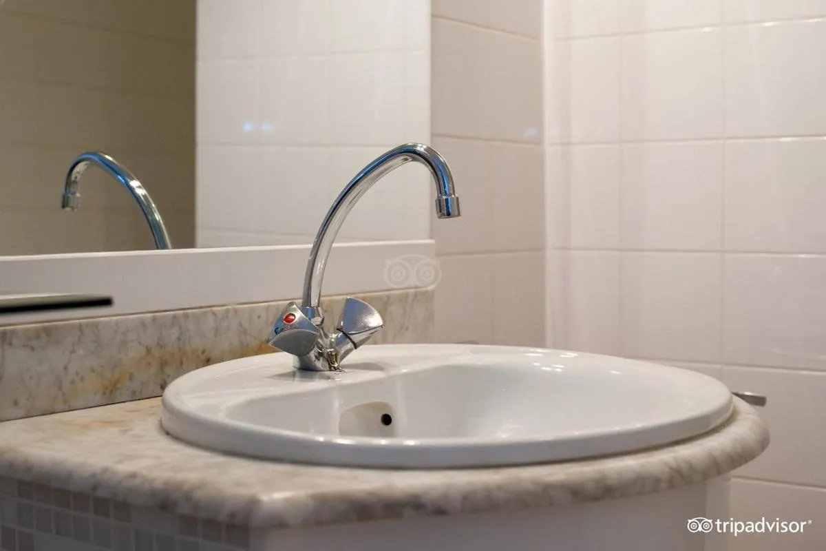 Bathroom in Rho Hotel