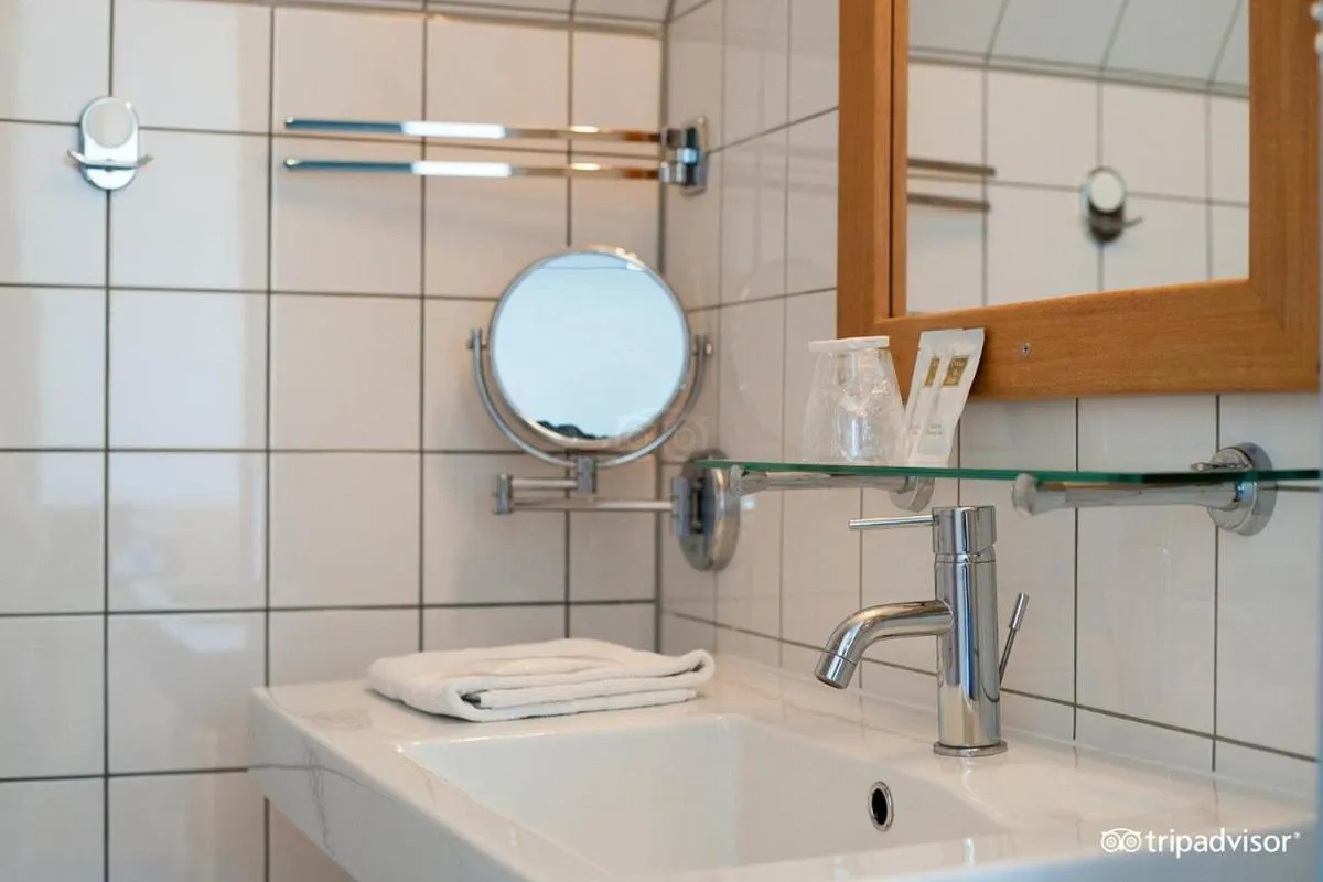 Bathroom in Rho Hotel