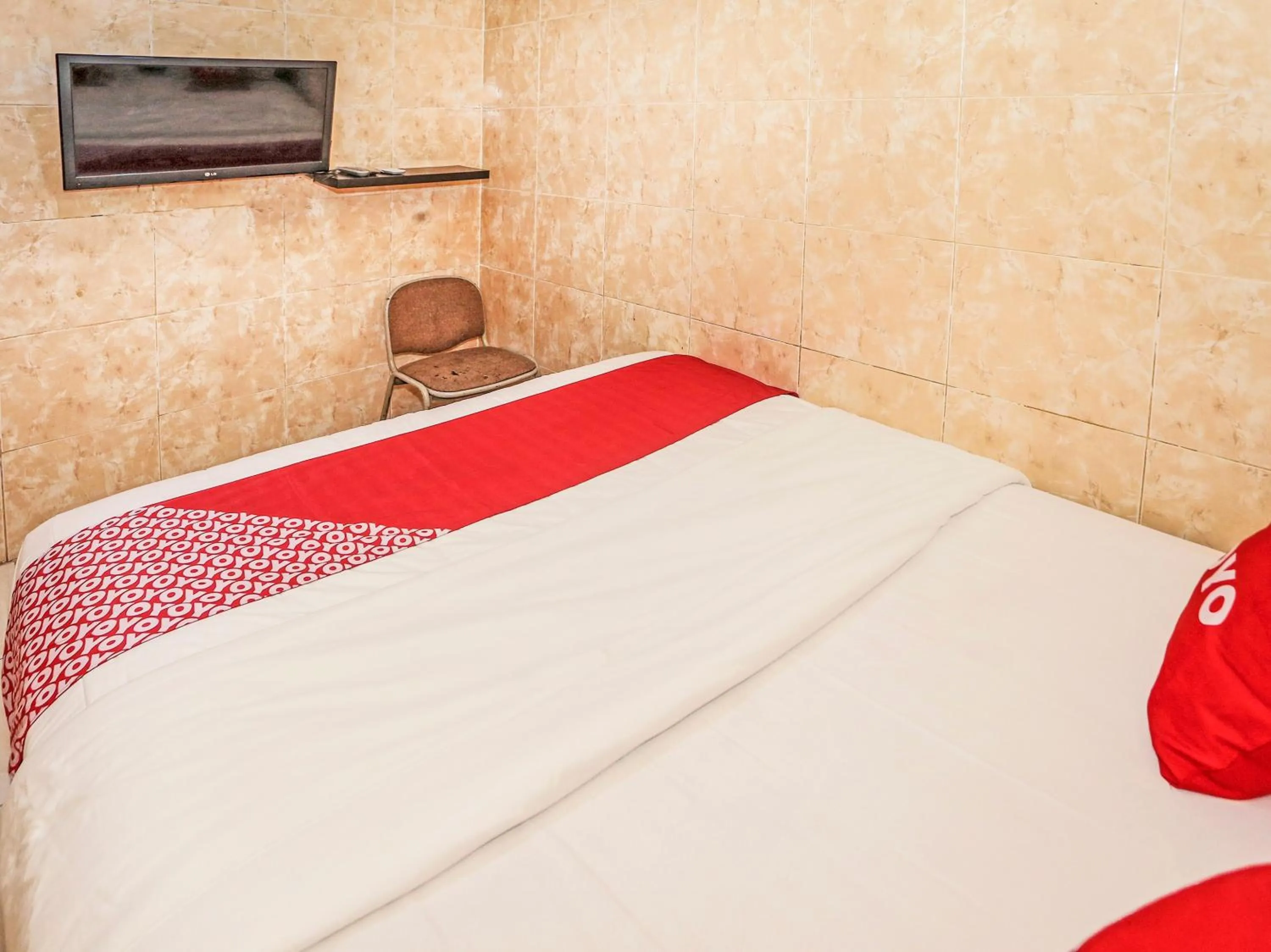 Bedroom in Hotel O Bsd