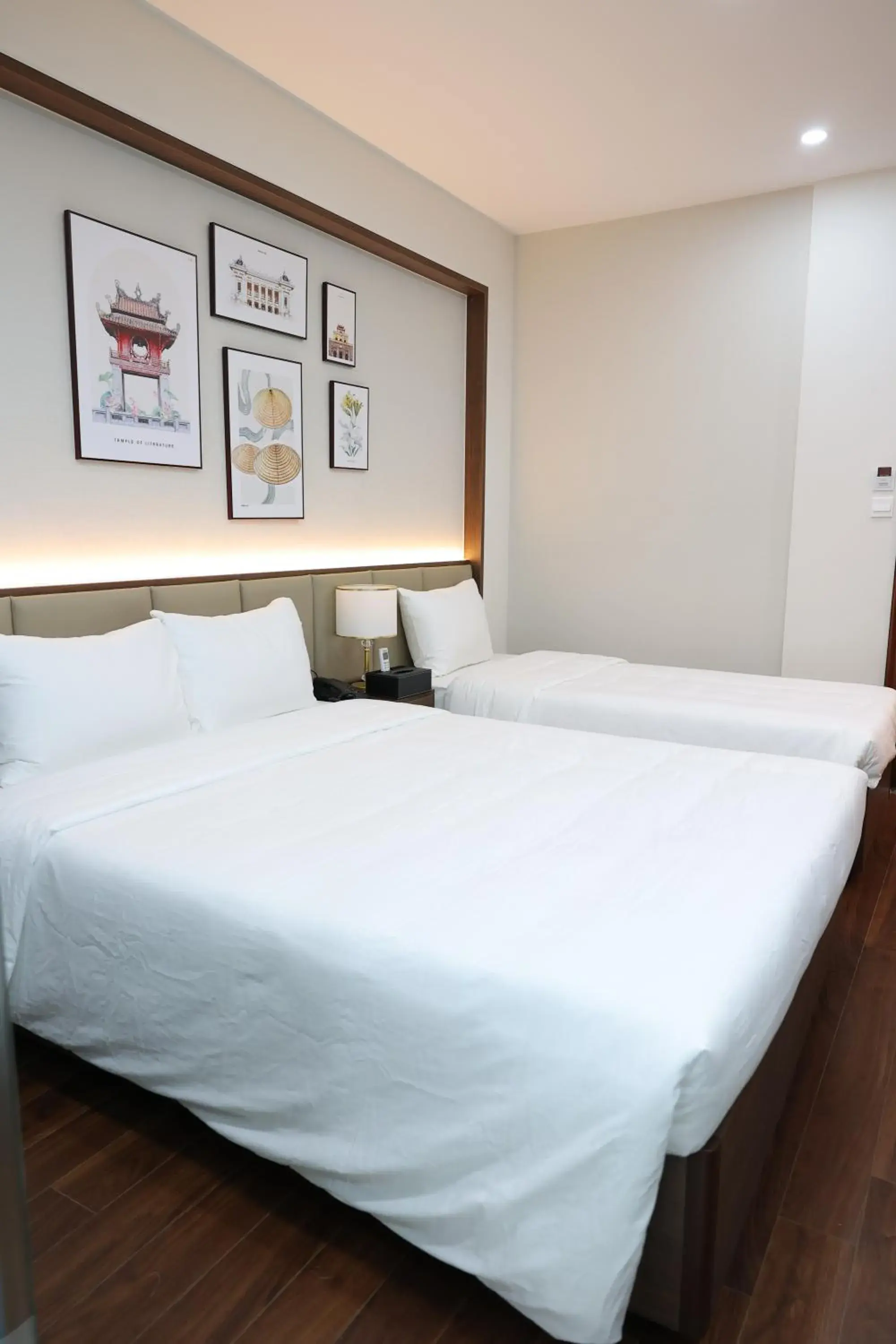 Bed in The Cosy Inn Hanoi Bed in The Cosy Inn Hanoi