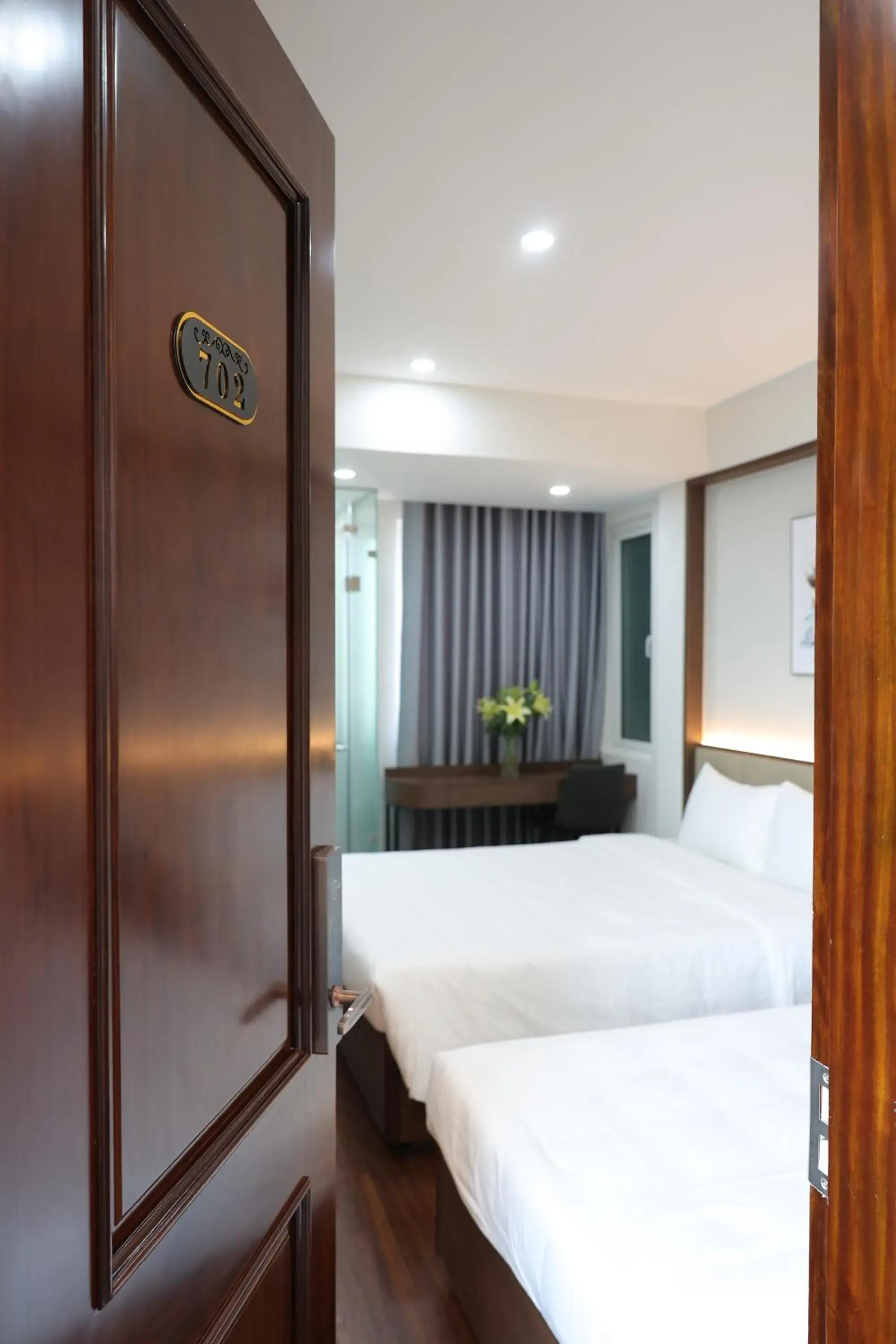 Bed in The Cosy Inn Hanoi Bed in The Cosy Inn Hanoi