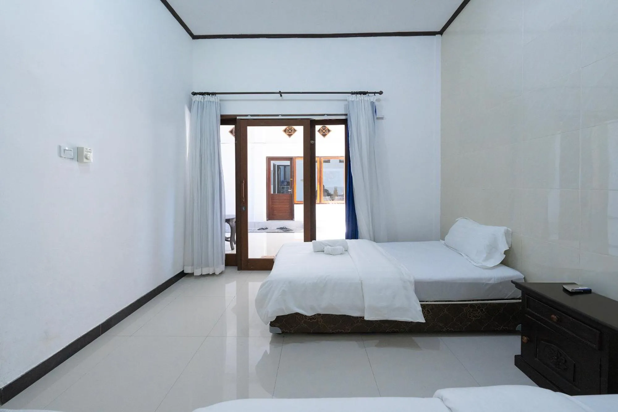 Bed in Dive & Dwell Tulamben