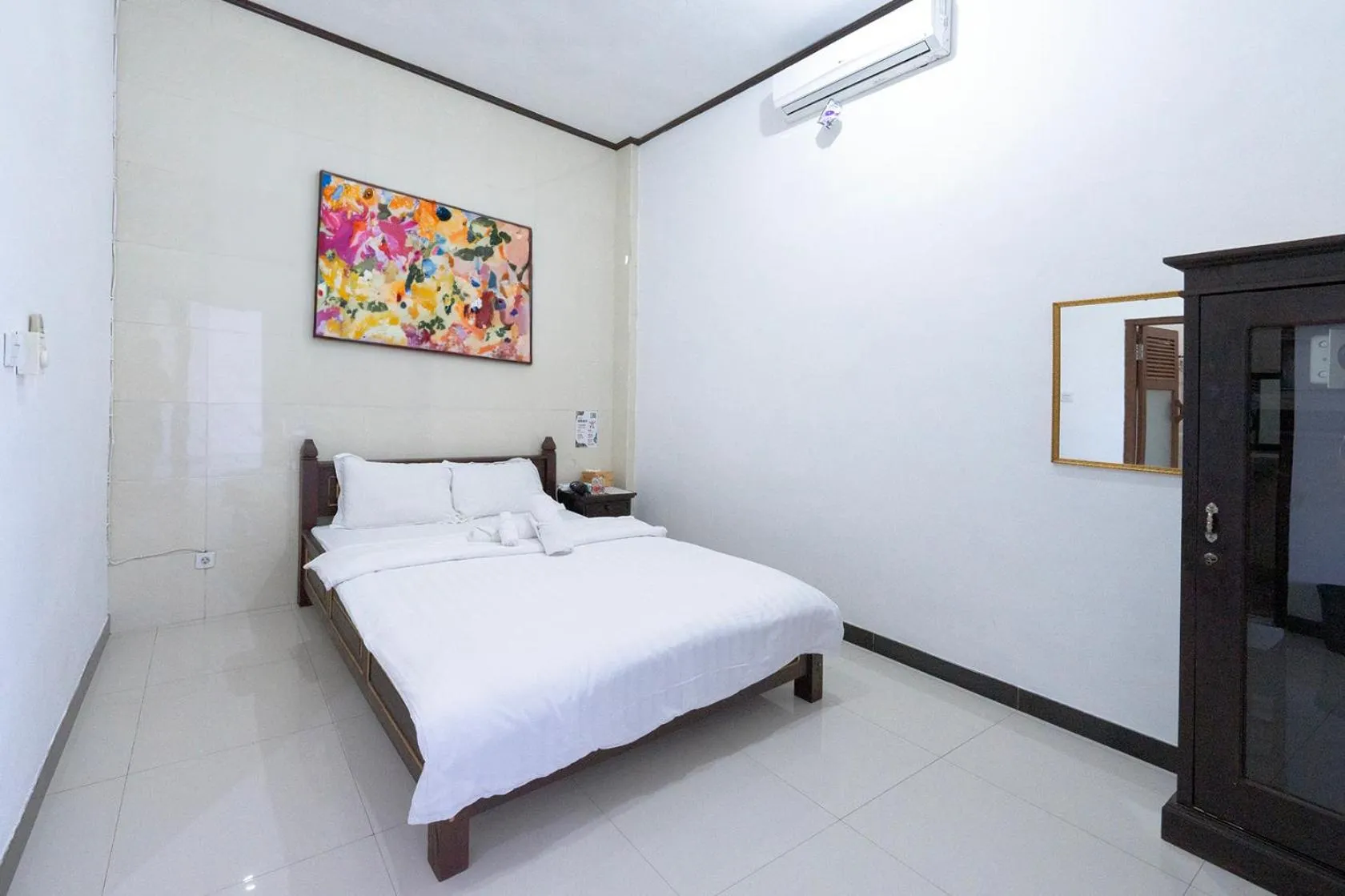 Bed in Dive & Dwell Tulamben