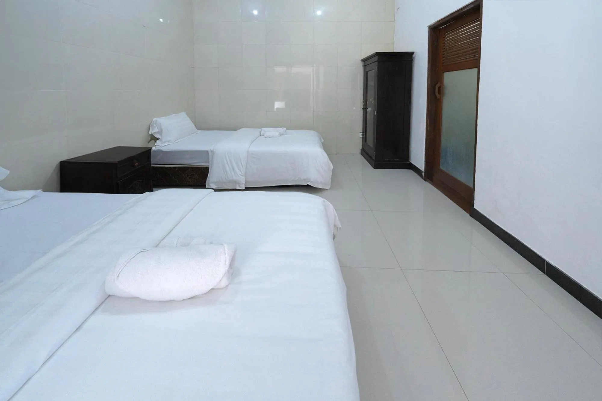 Bed in Dive & Dwell Tulamben