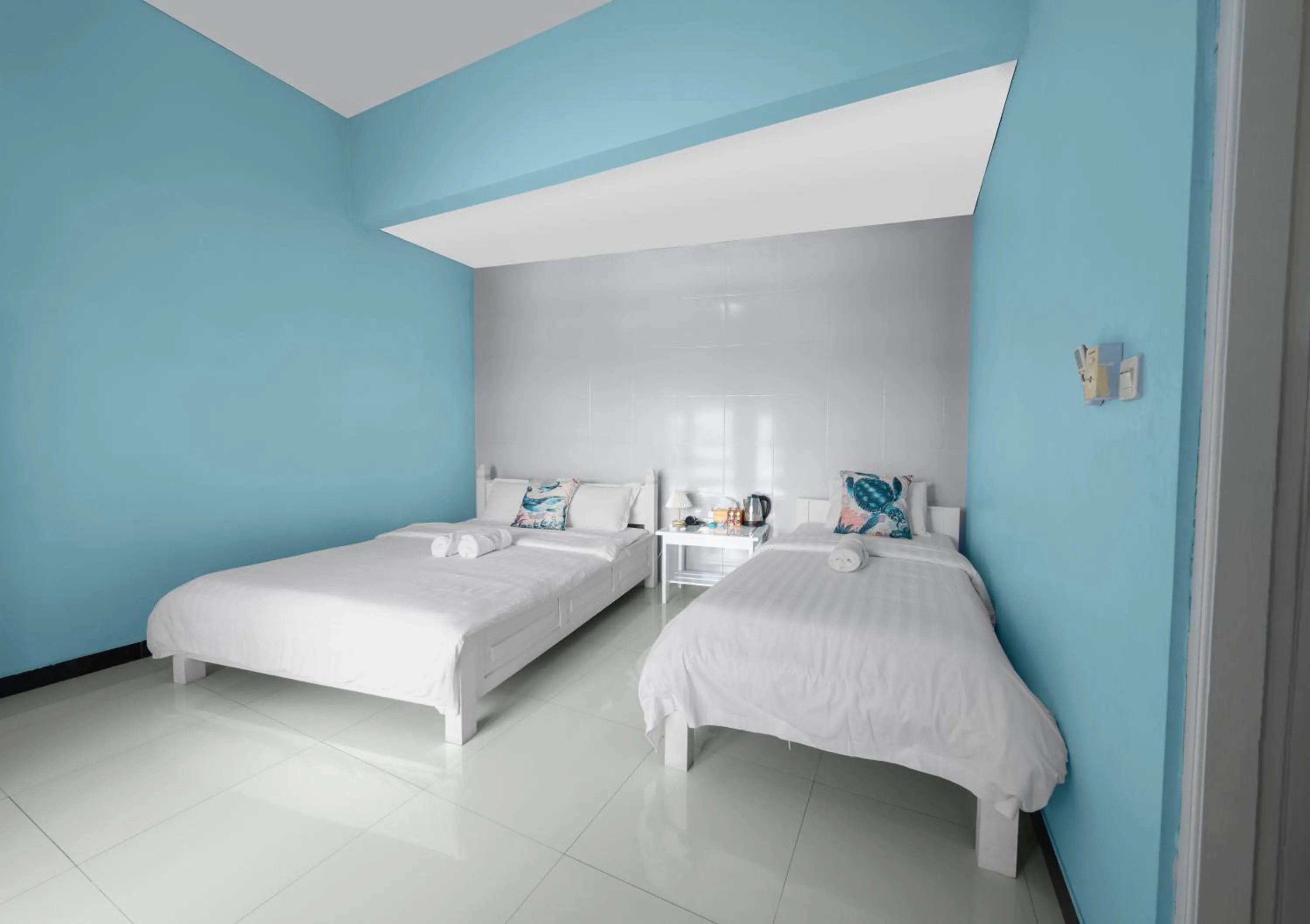 Bed in Dive & Dwell Tulamben