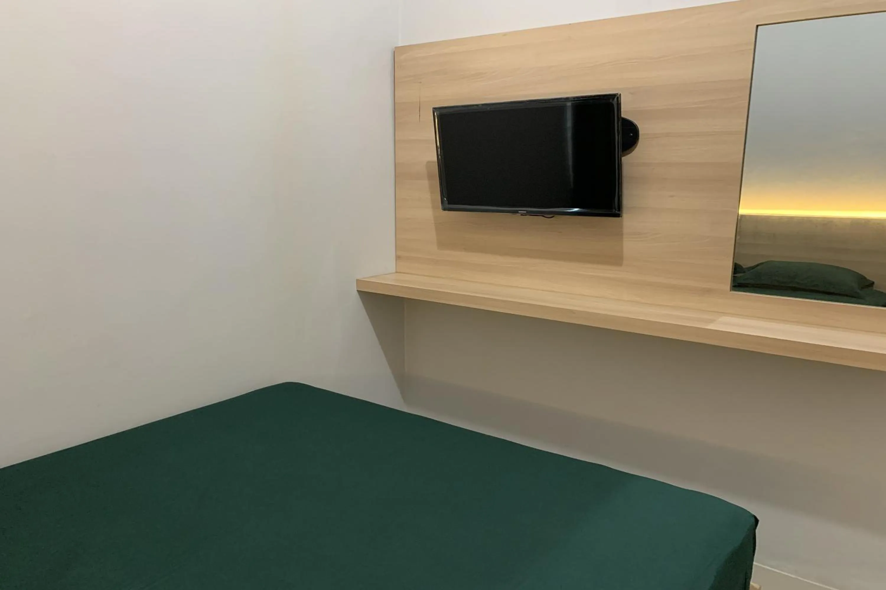 Bed in Hotel Merak Indah