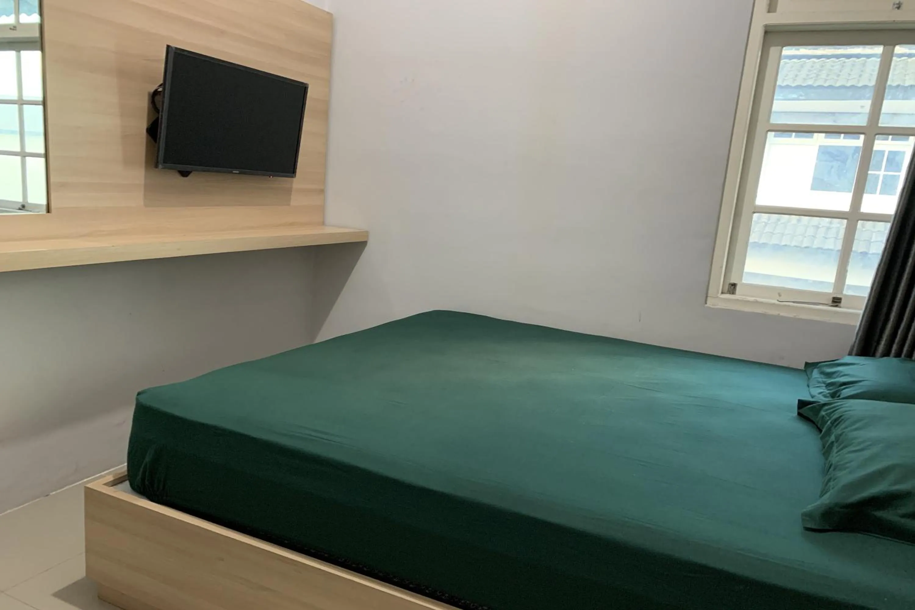 Bedroom, Bed in Hotel Merak Indah