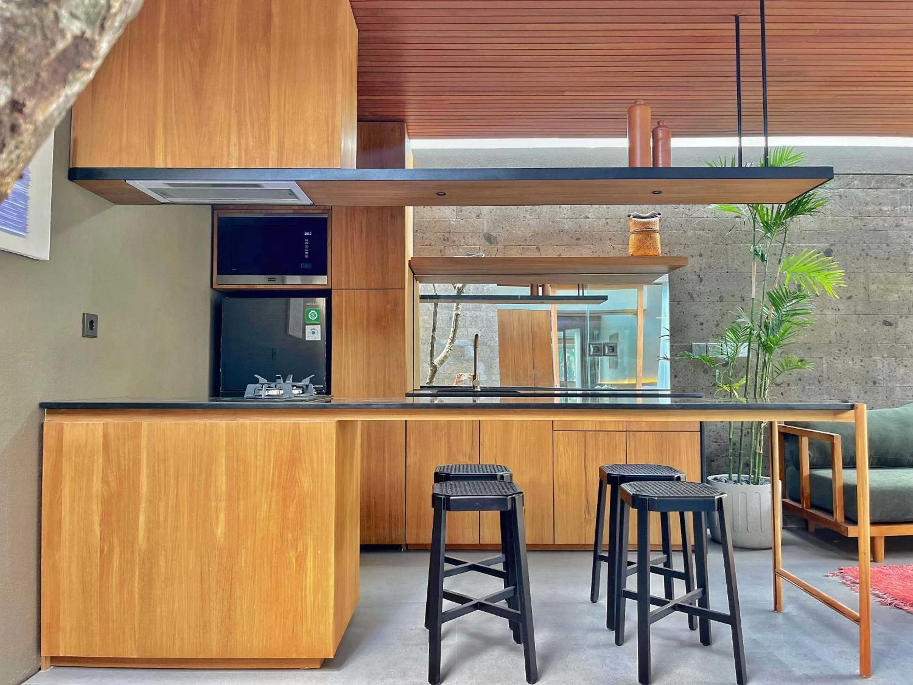 Kitchen or kitchenette in Domisili Villas Canggu Bali by Fays Hospitality