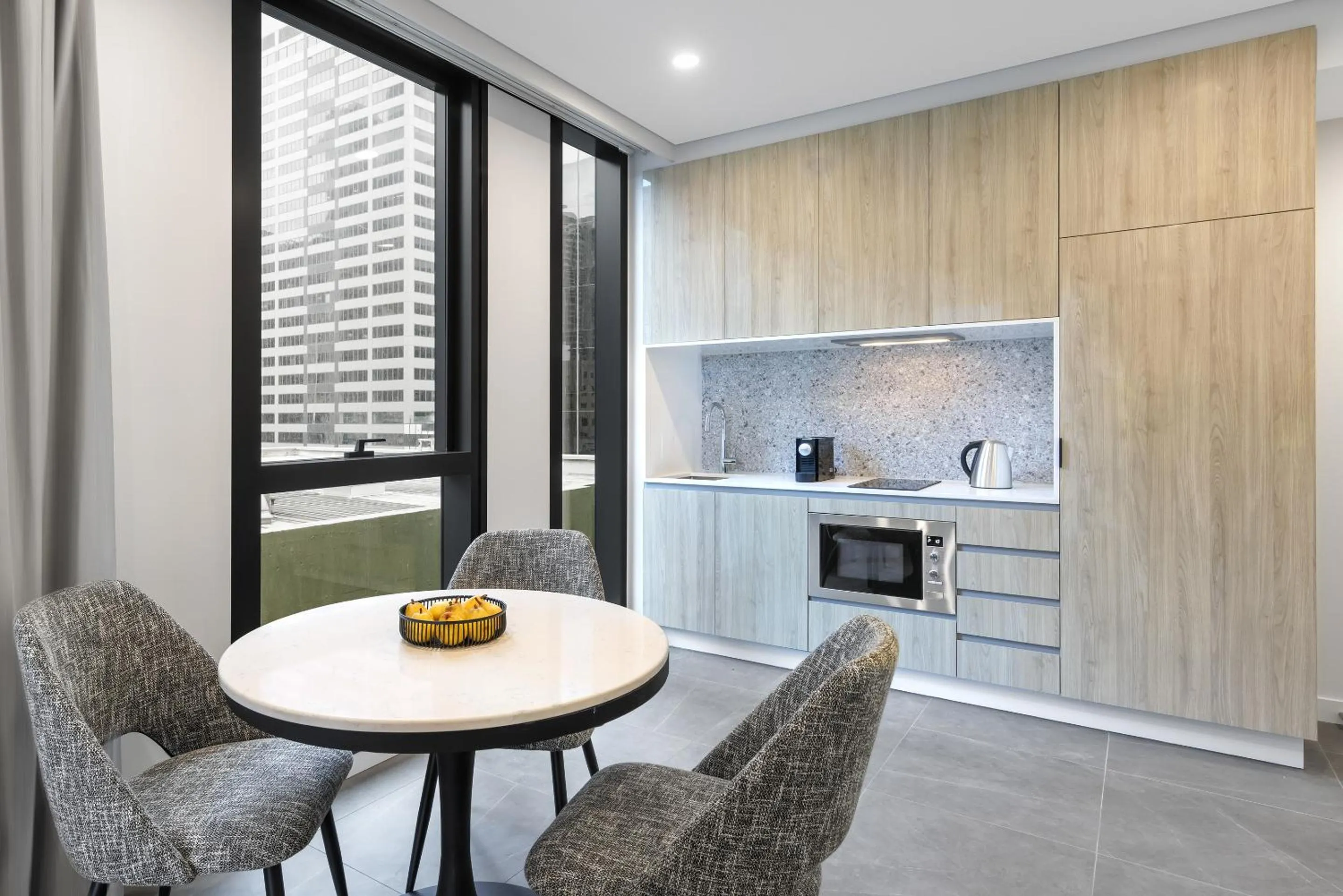 Dining area in Meriton Suites Melbourne