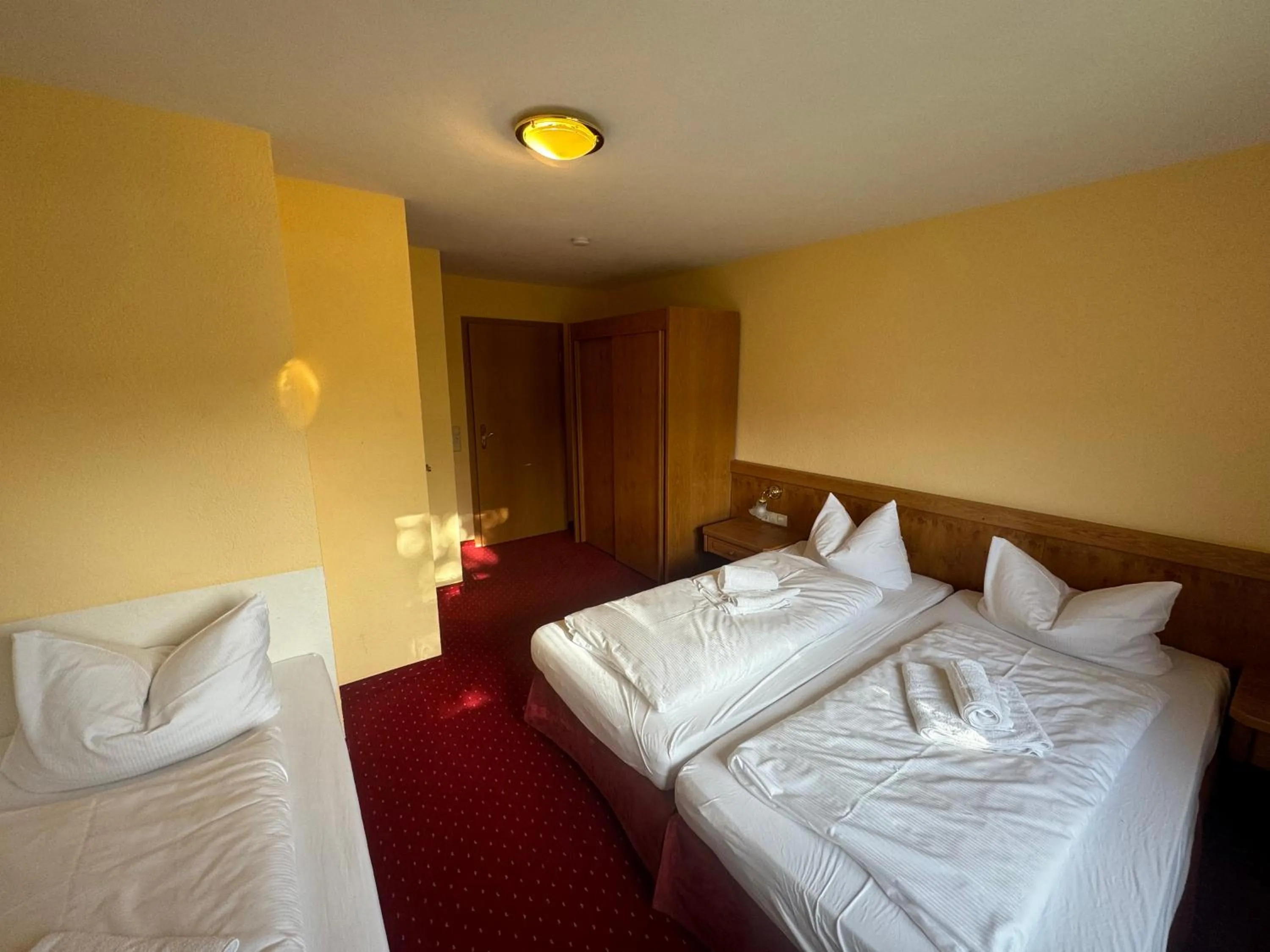 Photo of the whole room, Bed in Landhotel Alte Post