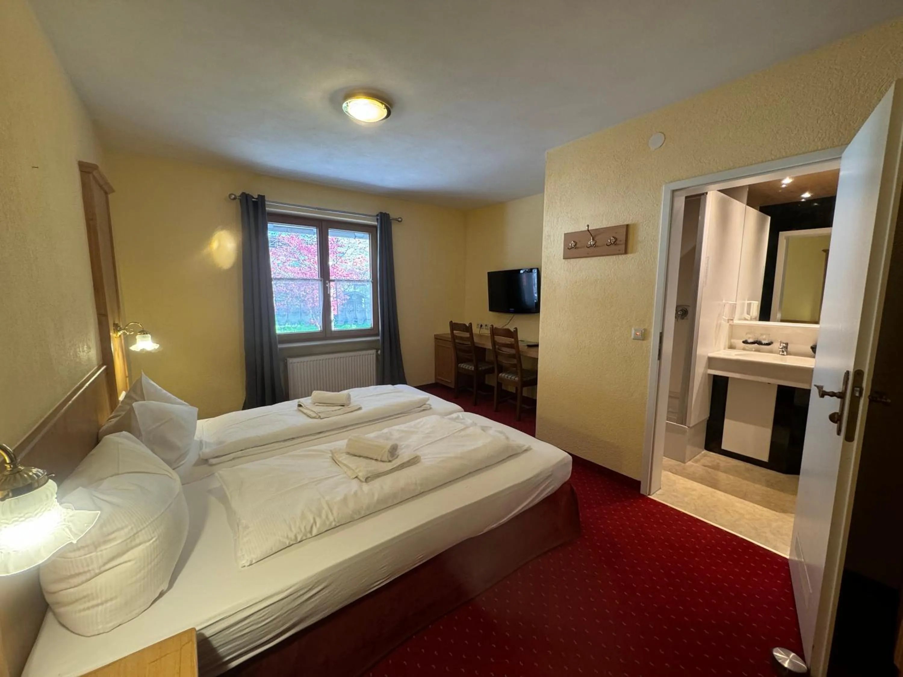 Photo of the whole room, Bed in Landhotel Alte Post