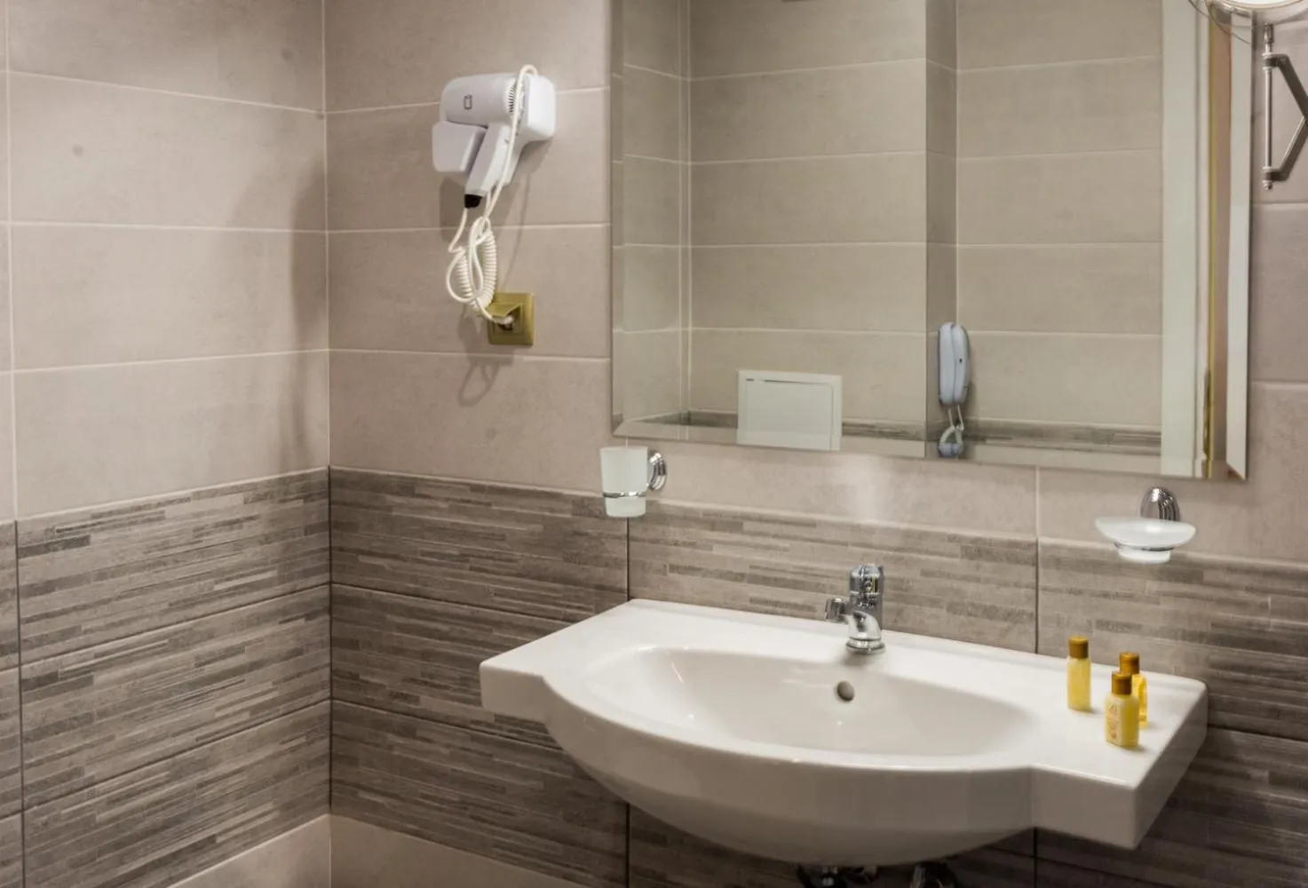Bathroom in Vemara City Boutique Hotel-free parking