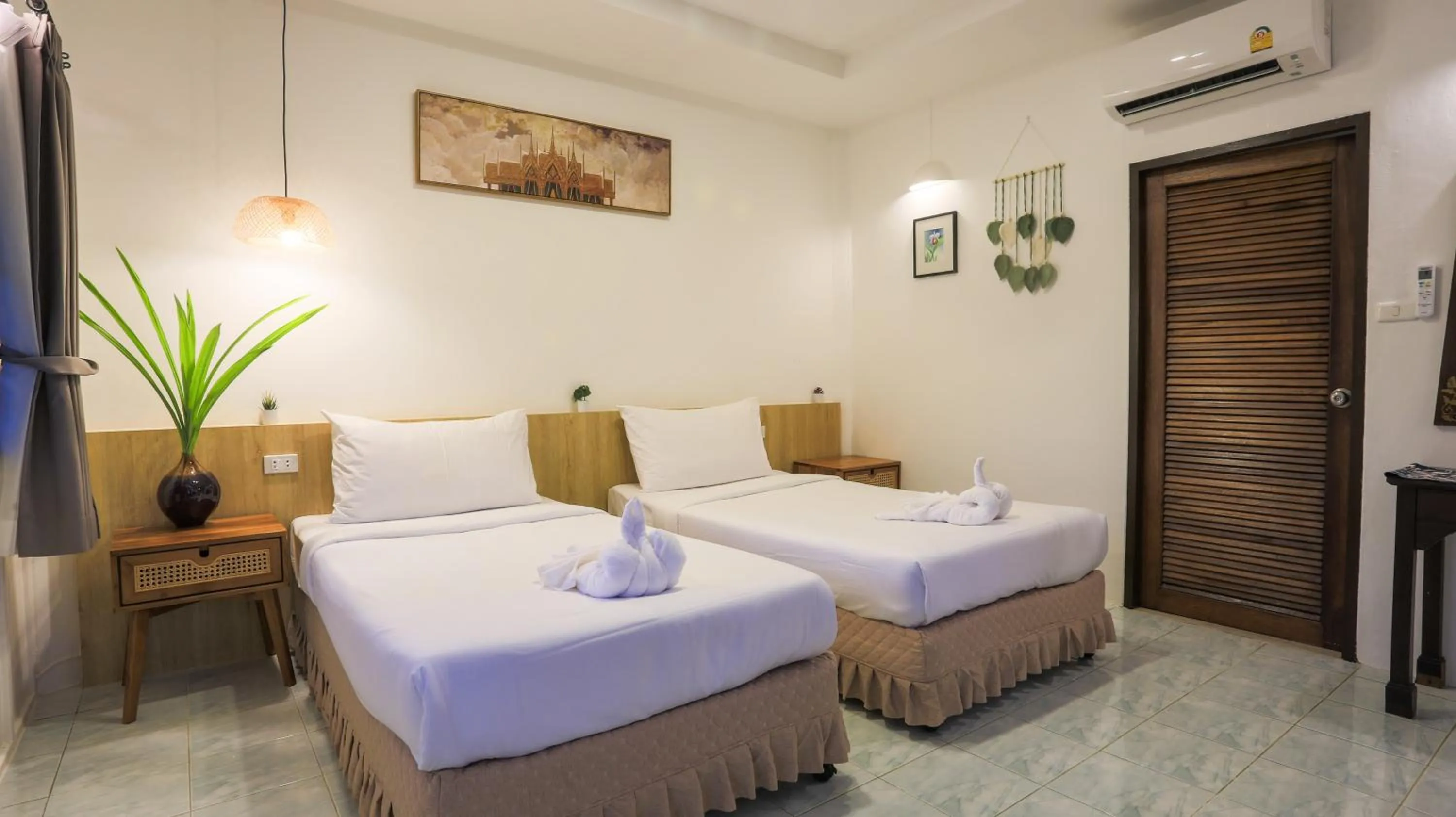 Bed in Ban Raya Resort and Spa