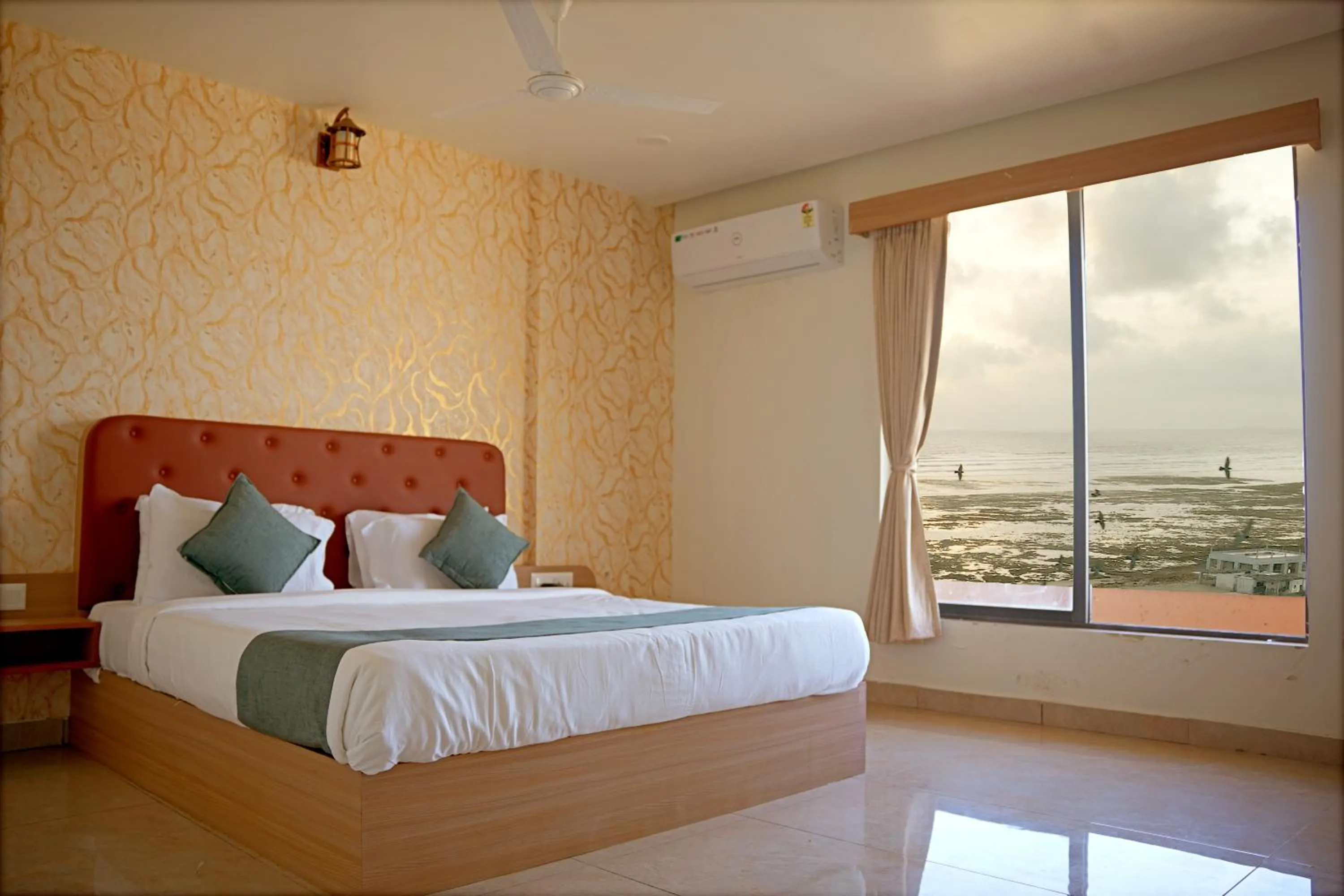 Bedroom in The Sky Comfort Beach Hotel, Dwarka