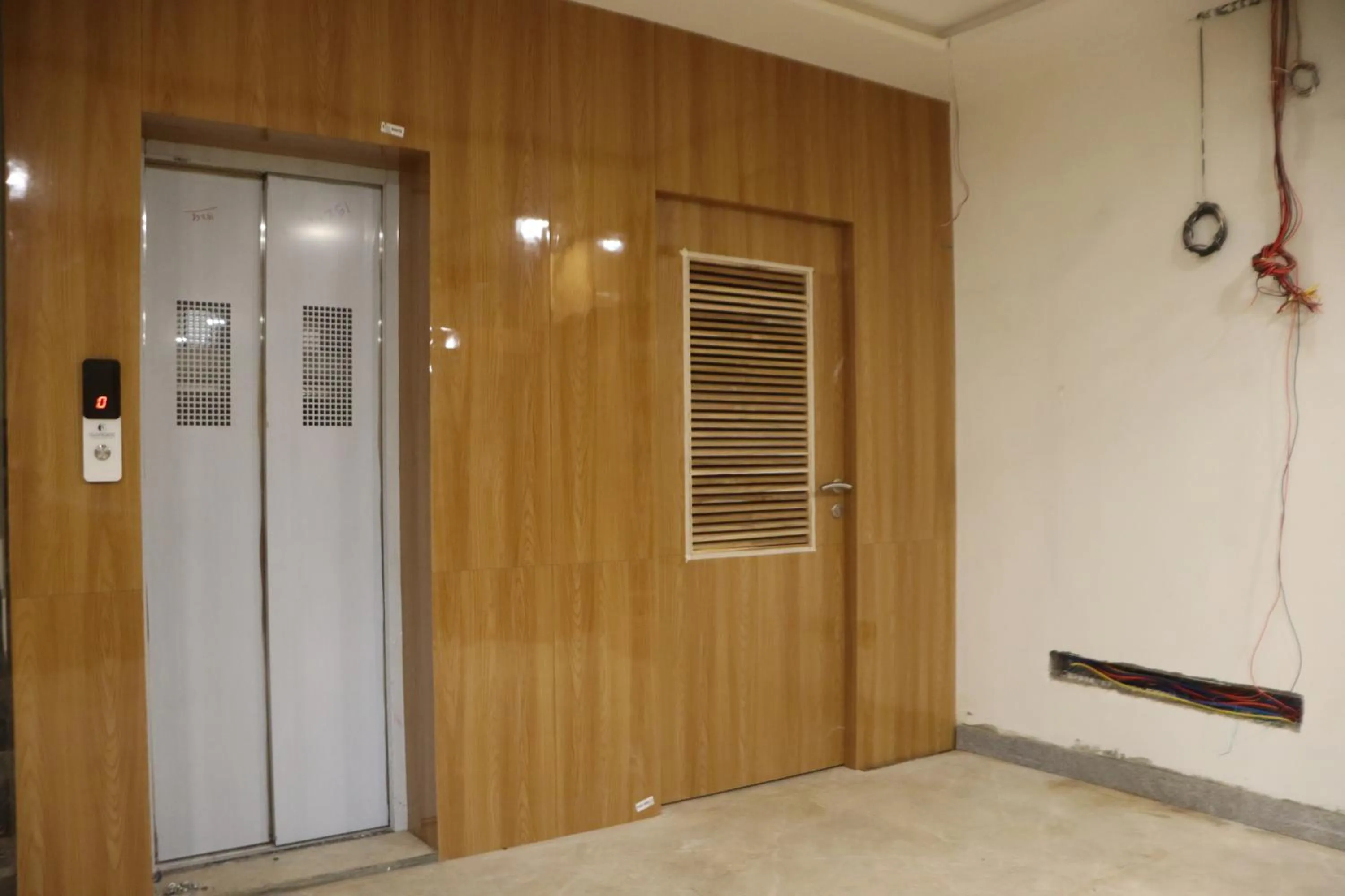 elevator in The Sky Comfort Beach Hotel, Dwarka