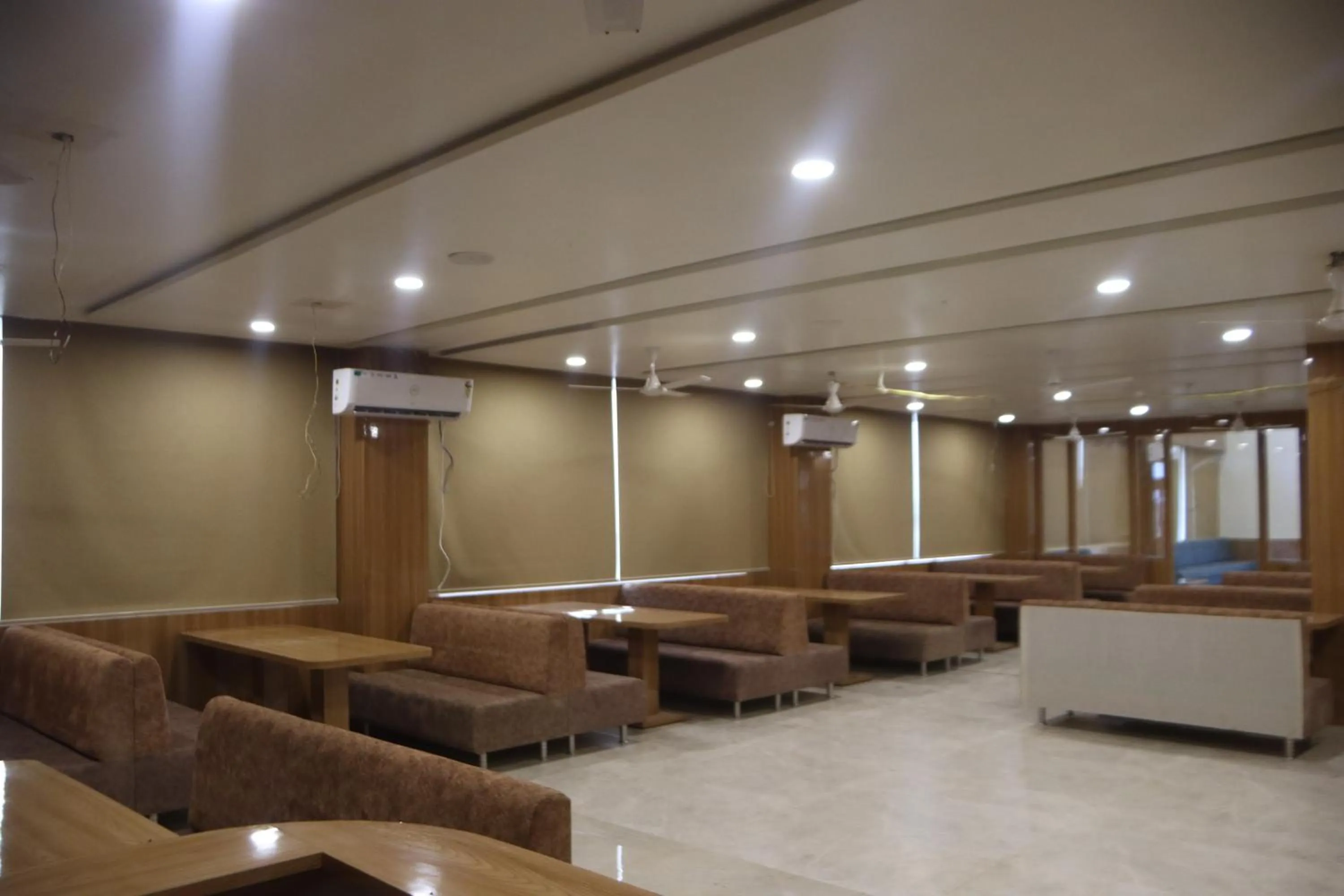 Dining area in The Sky Comfort Beach Hotel, Dwarka