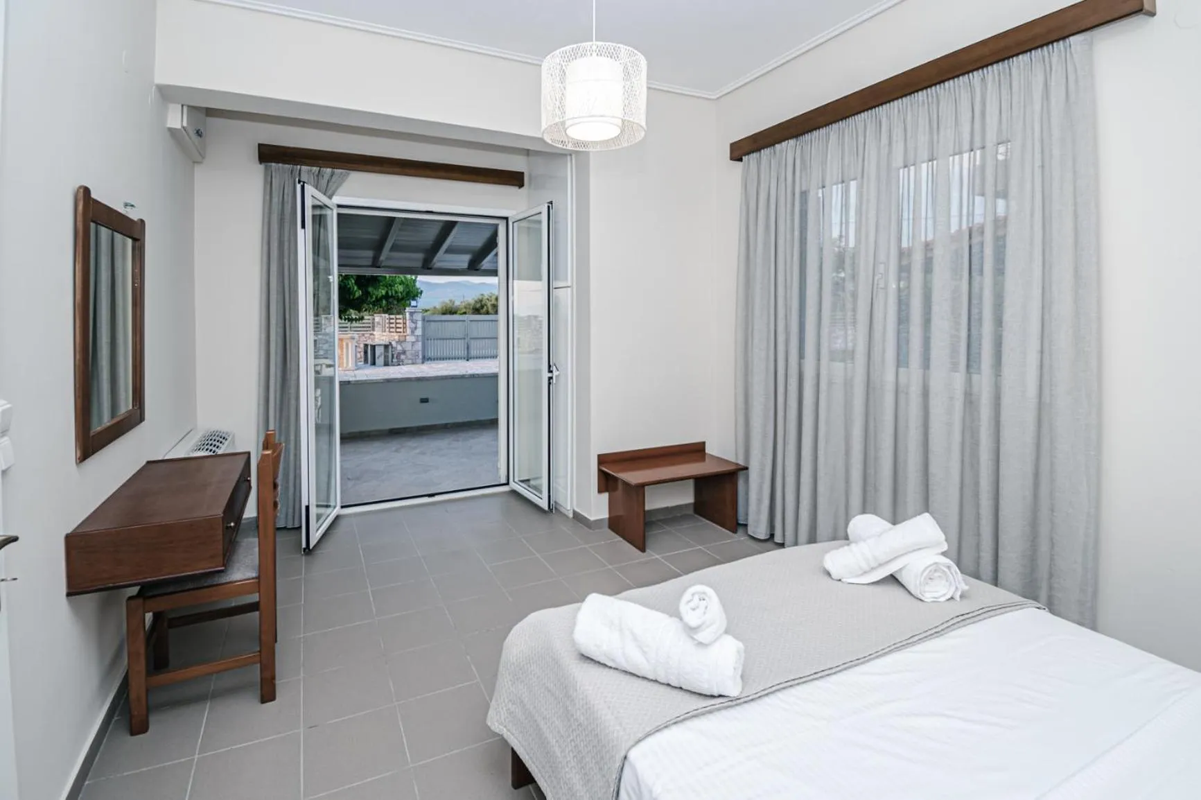 Photo of the whole room, Bed in Terra Hélios Suites & Studios