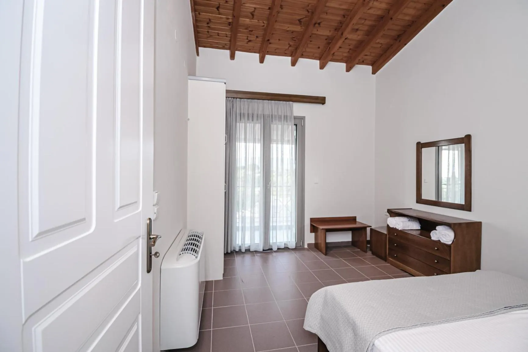 Photo of the whole room, Bed in Terra Hélios Suites & Studios