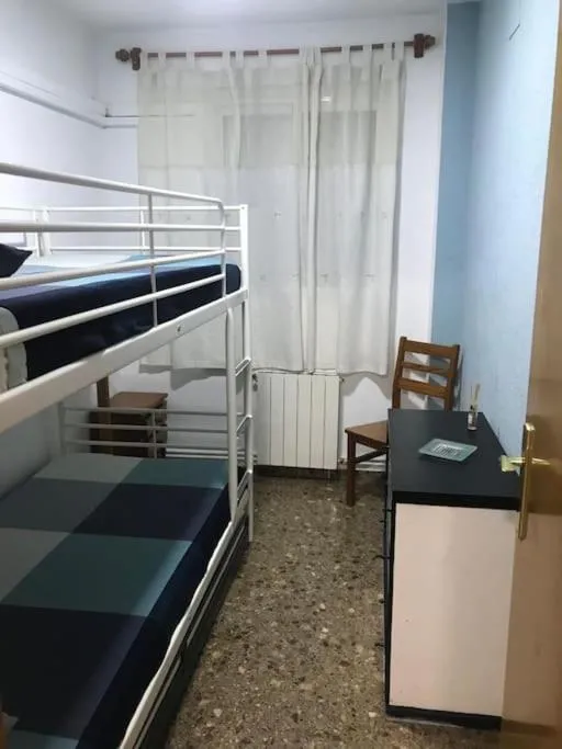 Photo of the whole room, Bed in Apartamento cómodo y espacioso con parking
