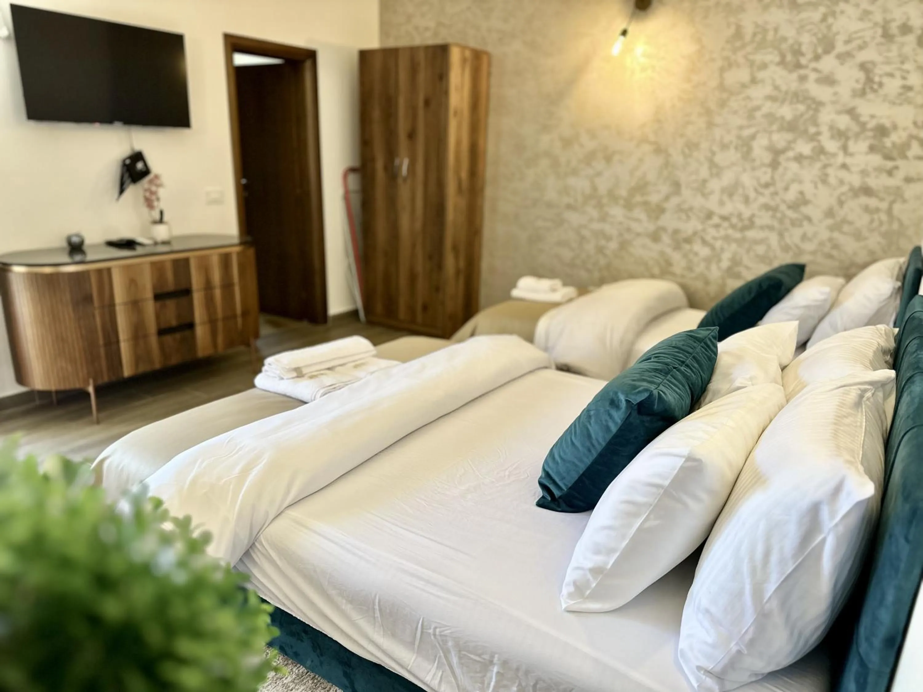 Bed in Akhdar Apartments