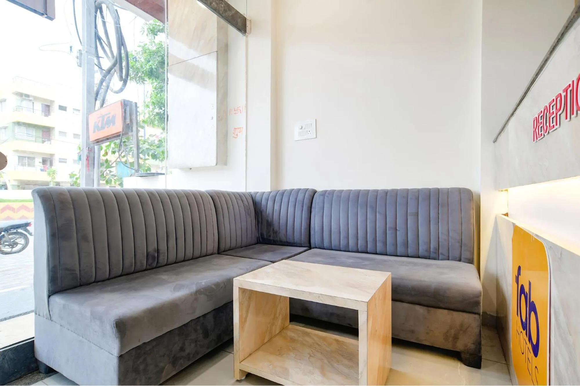Seating area in FabHotel Woodlark Inn