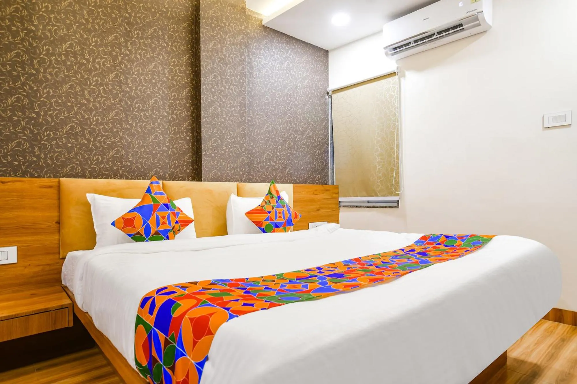 Bed in FabHotel Woodlark Inn