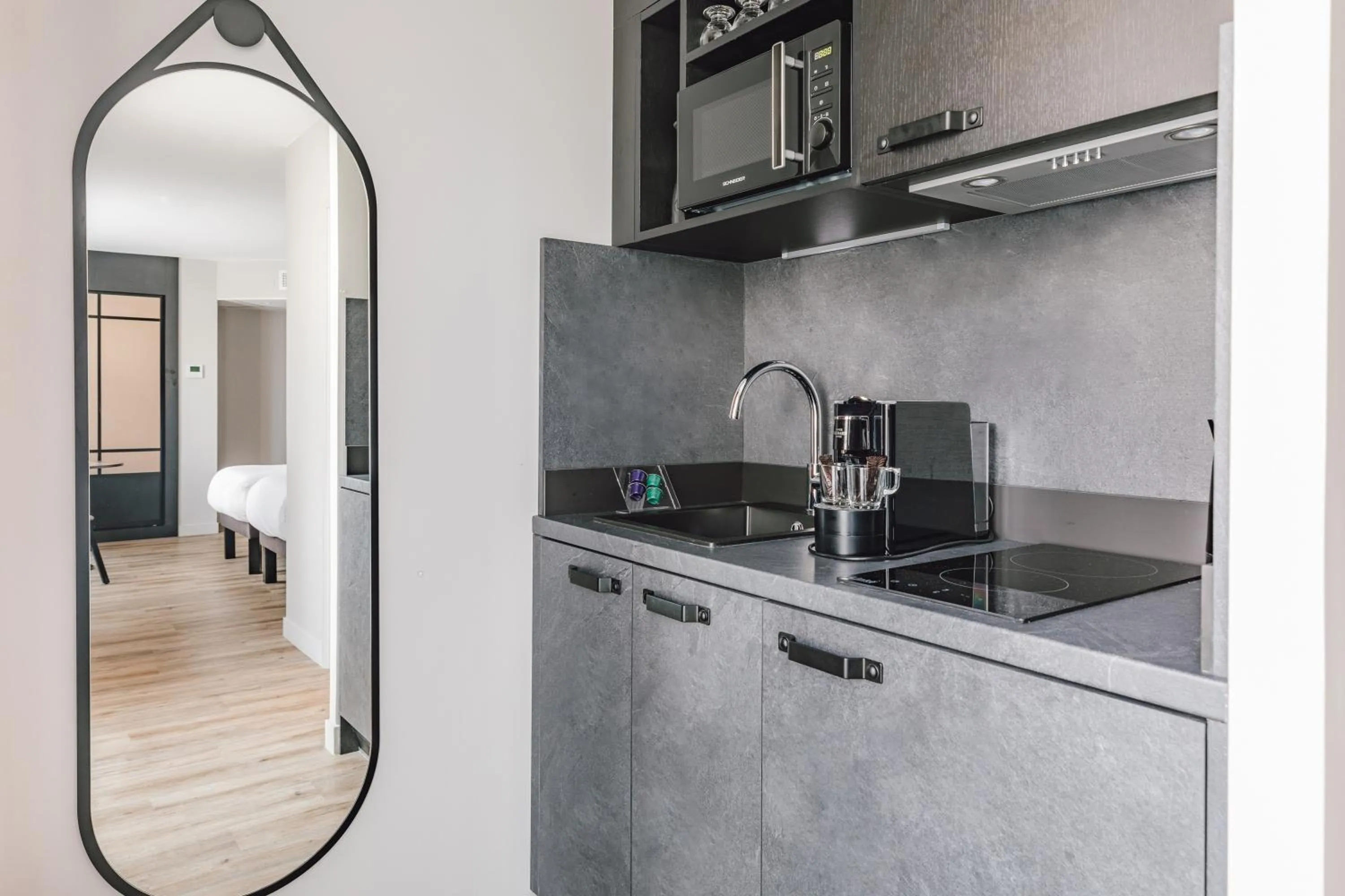 Kitchen or kitchenette in Appart'City Collection Paris Gare de Lyon