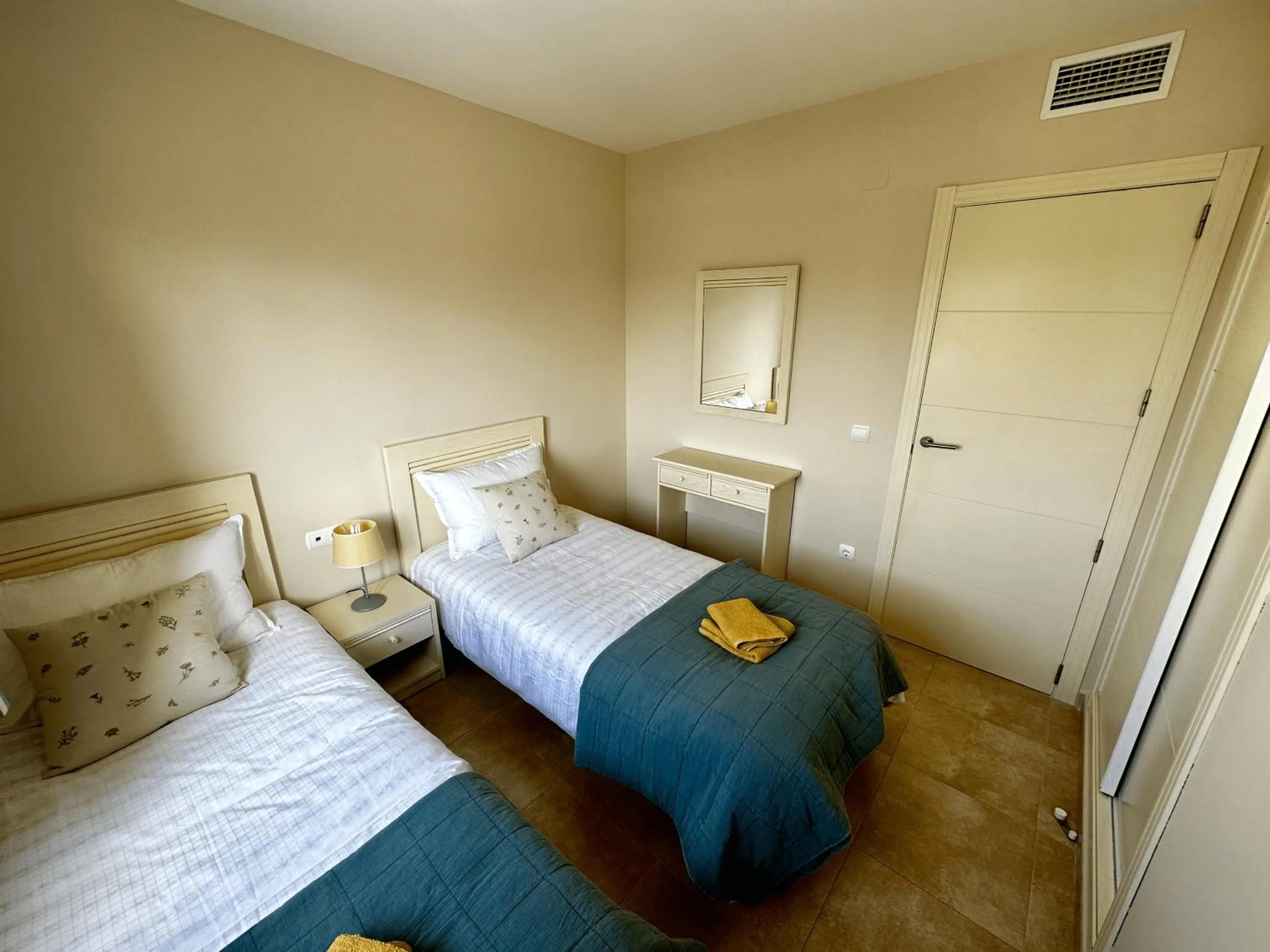 Bed in Esmeralda Suites