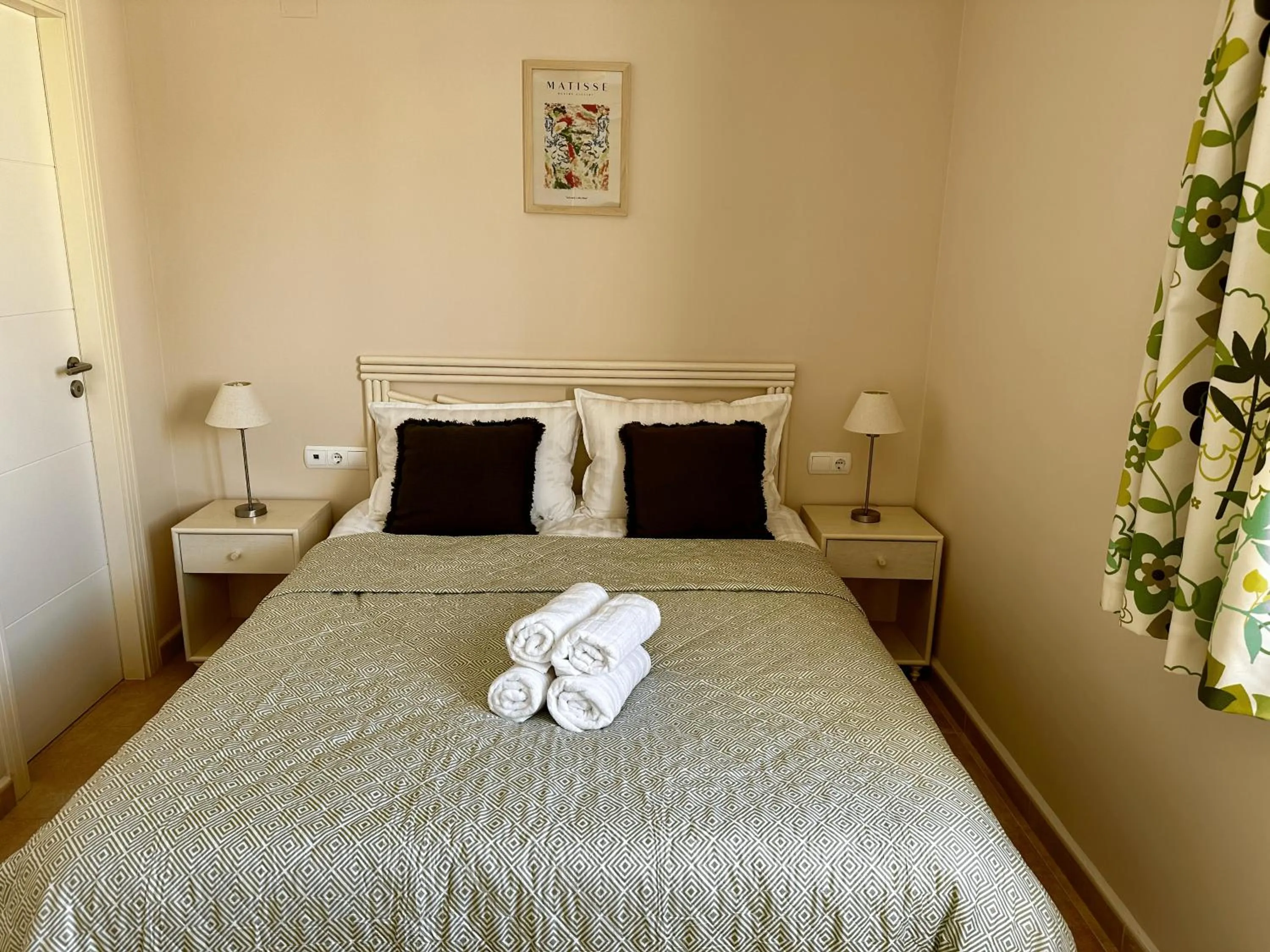 Bed in Esmeralda Suites