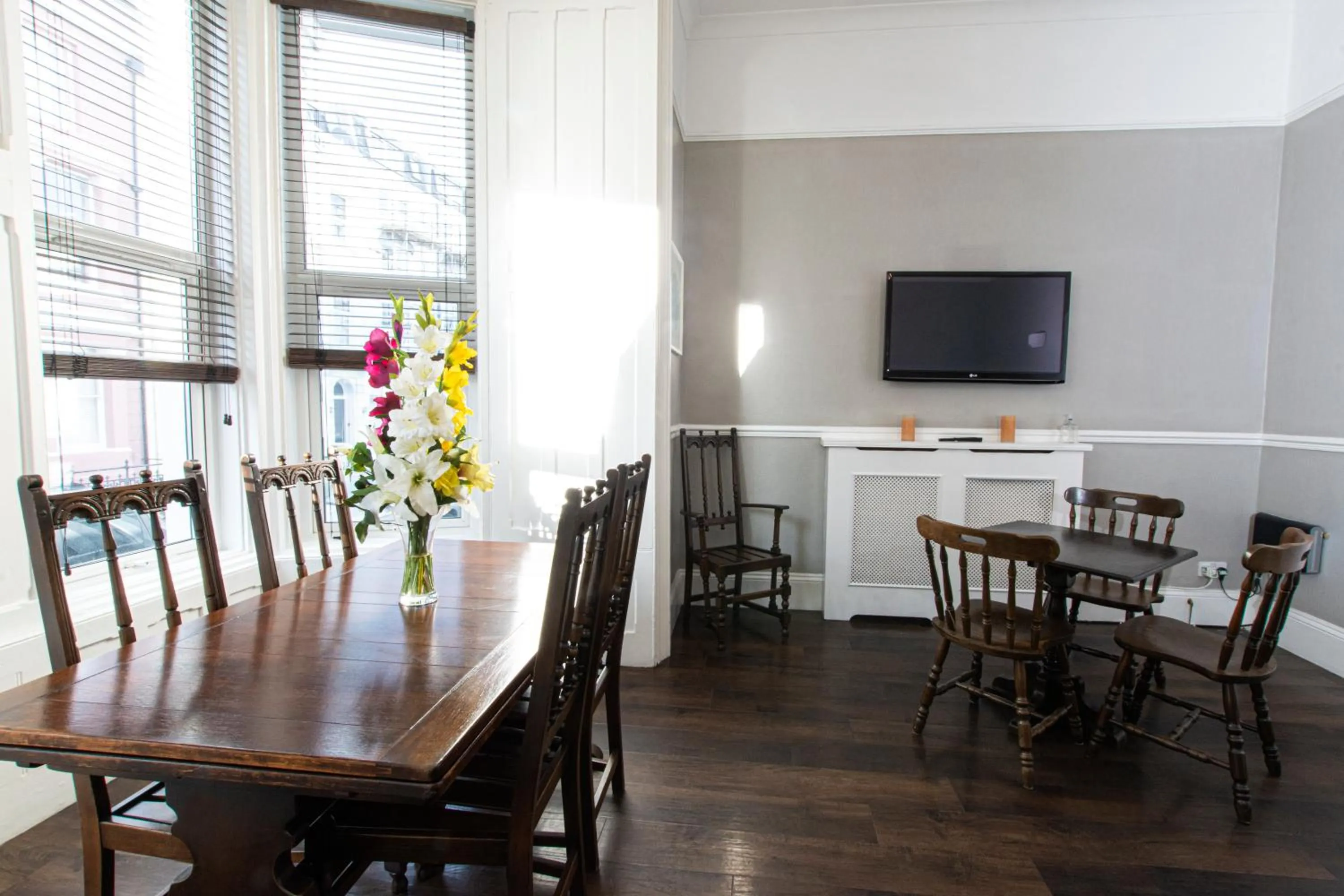 Communal lounge/ TV room in The Grosvenor Plymouth