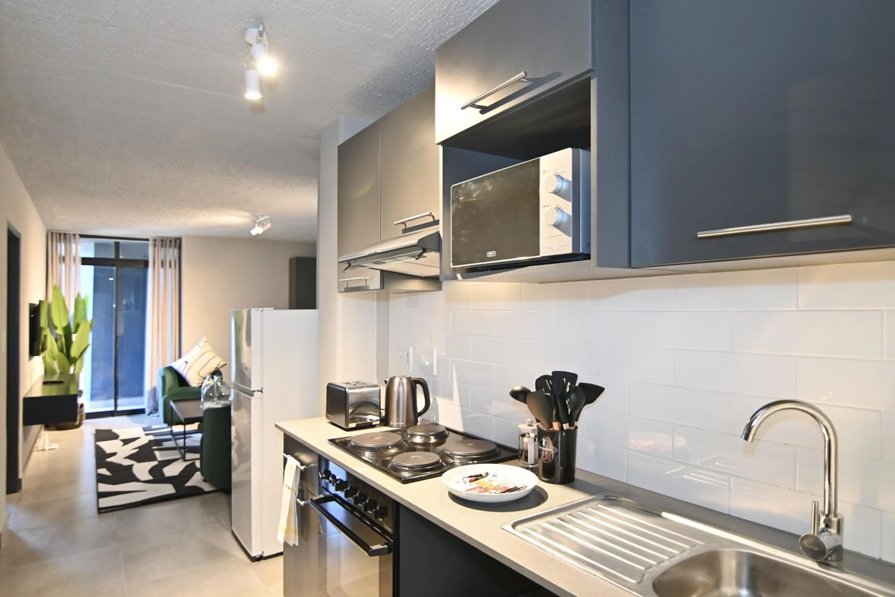 Kitchen or kitchenette in Circa Aparthotel by Totalstay