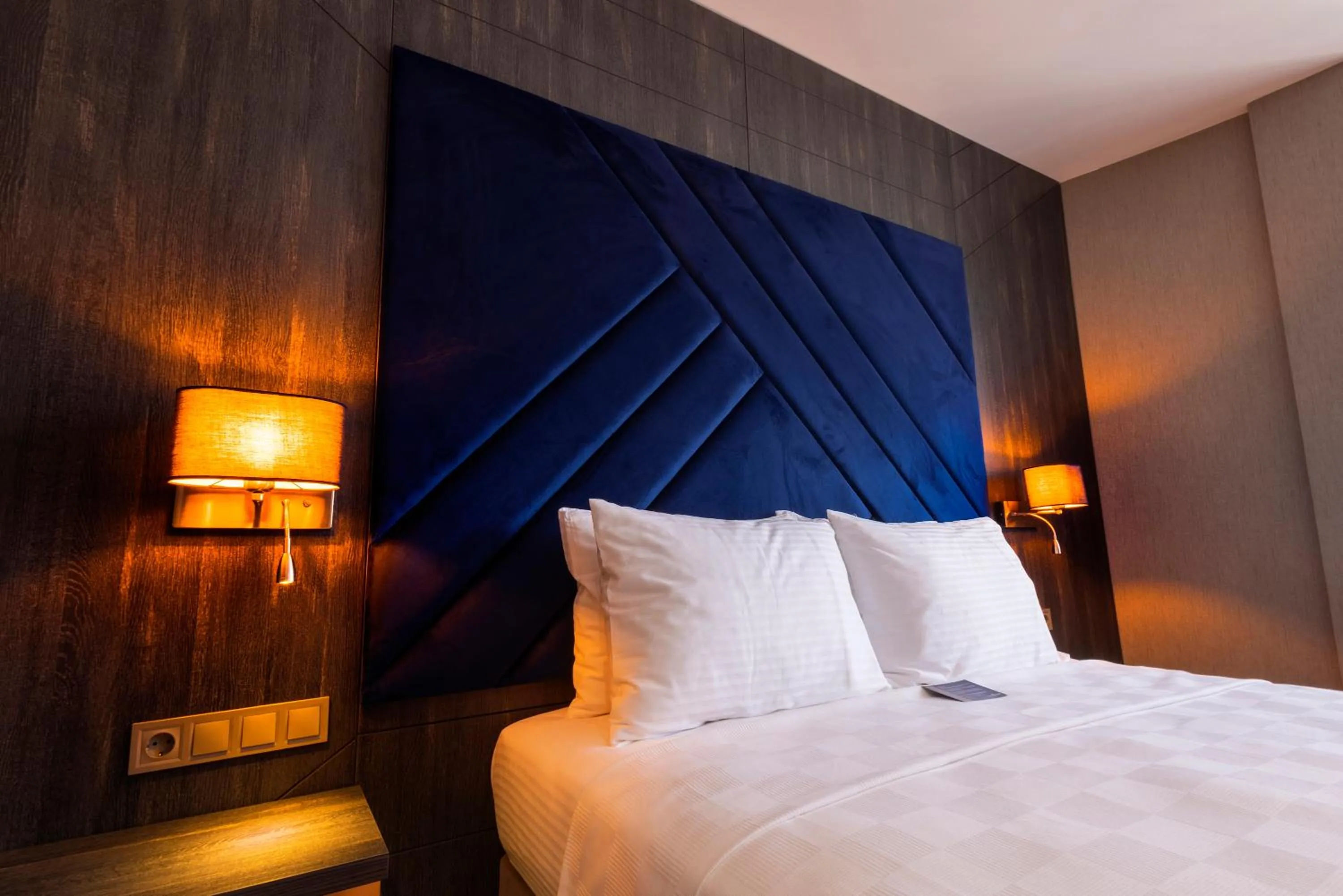 Bed in WestDoor Hotel